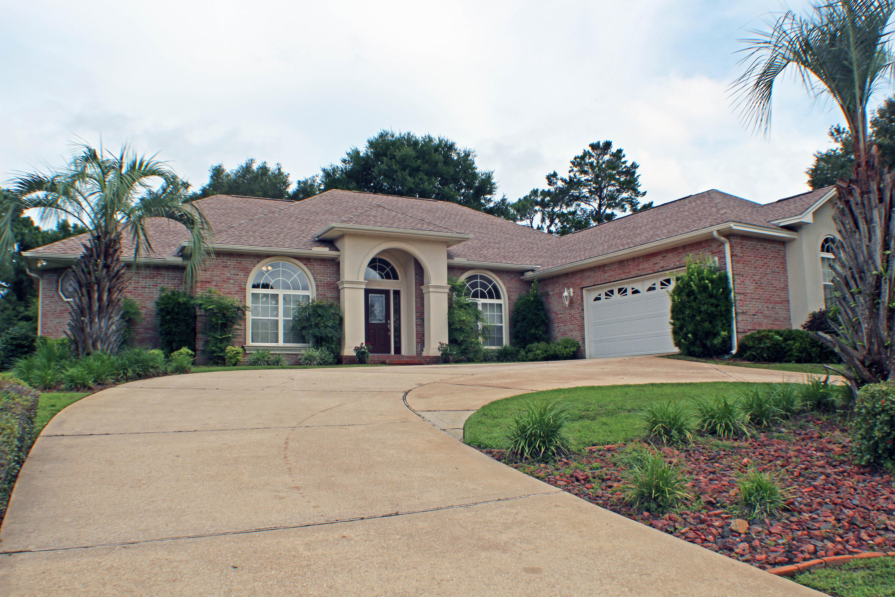 Come feast your eyes on this custom-built home situated on the 17th hole of the Rocky Bayou Country Club. Functional half-circle driveway and meticulously maintained landscaping. Brand new roof put on last month (May 2018) with a transferrable warranty. As you walk into this golf course home, your formal dining room is to your right and your formal sitting room is just ahead of you with access to your large - over 44 feet long - Florida room. All new ceiling fans are sure to keep you cool this summer. On this wing of the home is your expansive master suite with his-and-her walk-in closets and the master bathroom with his-and-her vanities, a jacuzzi tub, and separate shower with brand new glass door. There is also a guest room which can double as an office with French doors and a full hall bathroom with access to the Florida room. Back down the hallway past the dining room is your gourmet kitchen complete with all new stainless steel appliances including double ovens, flat-top range, built-in microwave and dishwasher, Corian solid surface counter tops and sink, and unique planter shelf with recessed lighting, which flows into your breakfast nook and family room with a large, bricked fireplace as the focal-point as well as a 7-speaker built-in Bose home theater surround sound system. The laundry room has plenty of counter top and cabinet space with a second pantry area, built-in ironing board and access to your two-car garage with separate golf cart door is just across the hall. Your two additional bedrooms are on this wing of the home sharing a Jack and Jill bathroom. Sit out in your Florida room and watch the golfers take on the newly manicured course. Home warranty provided.