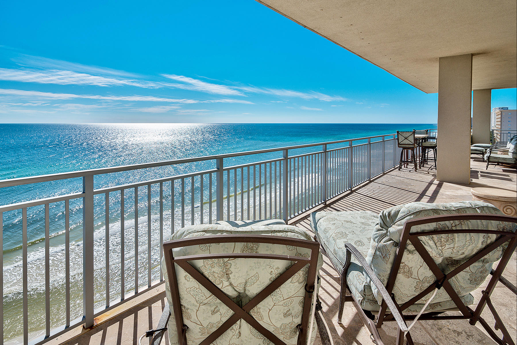 Enjoy luxury living in one of Destin's premier condominium complexes. With impeccable attention to detail inspired by the owner's European travels, this remodeled Signature Beach unit is reminiscent of a luxury villa. Floor to ceiling glass windows in the living, dining and master bedroom captures the dramatic and panoramic gulf views, and Destin skyline. The spacious balcony is a room in itself for entertaining or serving as a peaceful retreat while enjoying the beautiful sunsets Northwest Florida is known for. Immediately noticeable throughout the spacious, open floor plan are the custom features. Noche antique travertine flooring, walls resembling antique Venetian plaster, and a state of the art kitchen a master chef would envy with Wolf induction cooktop, two ovens, convection microwave and warming drawer are just some of the exquisite details this unit provides. Enjoy the custom installed surround sound system, with Klipsch Studio Reference speakers, remote operated drapes and shades, as well as amenities that include a rooftop pool offering peaceful views. This exclusive property, located in the heart of Destin, is within close proximity to top restaurants and entertainment making it an ideal year round home or vacation retreat.