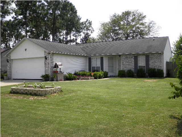 What a great house south of I-I0!!! This home features a split bedroom design and has a large great room with a cathedral ceiling, a roomy kitchen and cheery breakfast room. The kitchen has ceramic tile floors. Both baths have attractive Nafco tile floors. Extra shelving in closets. 2 Car Garage! The privacy fenced backyard is level and huge with a beautiful gigantic oak tree and an 8x10 yard building.