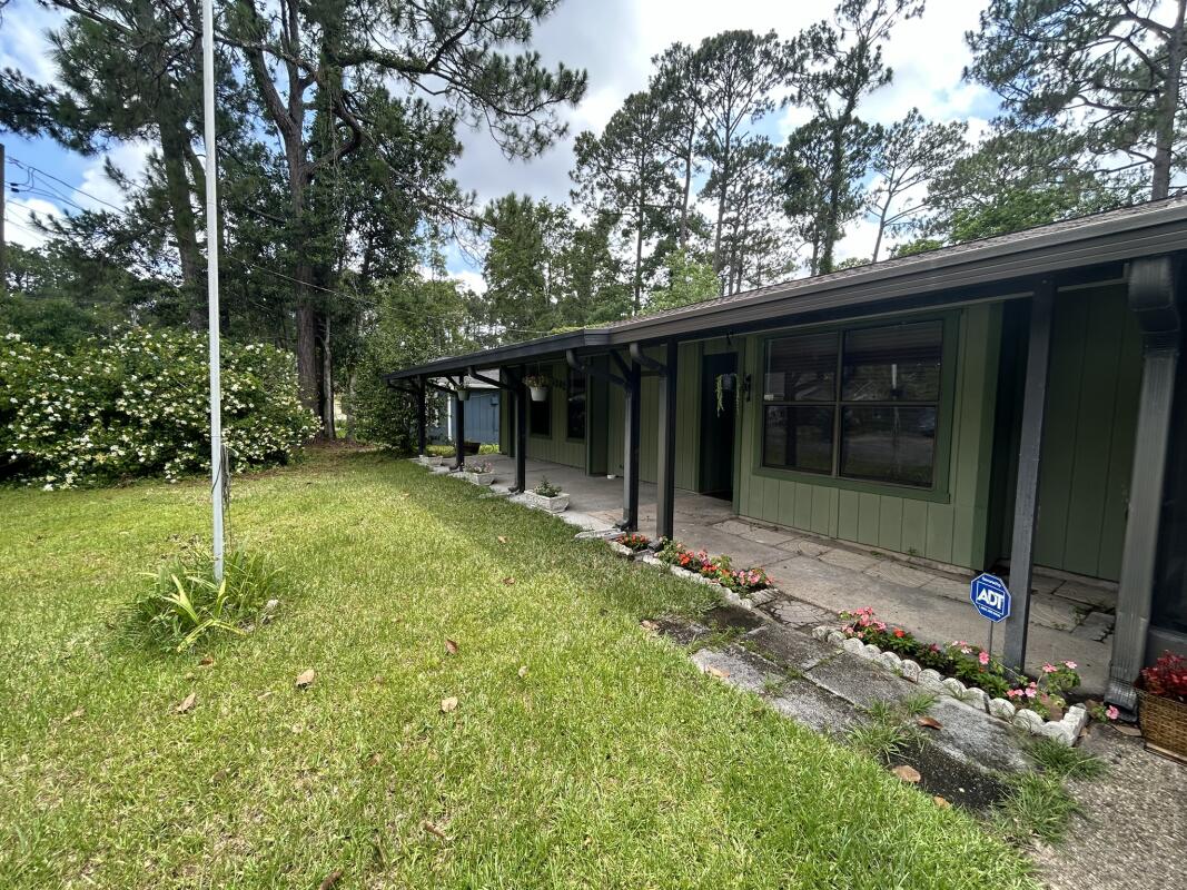 Motivated seller! Bring your offers. Fully renovated 3 bedroom home with 3 full bathrooms. Nestled in a quiet neighborhood & located within minutes of Hurlburt & Eglin AFB. No HOA. This home has been tastefully renovated throughout.
Updates include: New roof (2022), new LVP flooring throughout home, fresh paint & trim throughout, 2 bathrooms completely renovated, third bathroom partially renovated, new blinds throughout. Tiled kitchen was remodeled in 2021 & has newer stainless steel appliances & soft-close cabinets. Newer HVAC unit. Large living room. Partially screened front porch with light perfect for nights on the porch.. The unscreened portion offers built-in flower beds, and hanging plants.
Converted garage that was being used as a bedroom but could be used as  extra living space, dining room, office, exercise/art room, playroom, etc. Bathroom attached to the extra room as well as a separate door to enter from the outside.
Tiled sunroom with beautiful sliding windows leads out to a covered cement back porch. Large fully fenced backyard that is a mini oasis of greenery and space! The lush greenery provides privacy & serenity. Plant lovers rejoice!
Includes a gazebo-like structure perfect for lounging on outdoor furniture, picnics, etc.
A shed & a mini pond w/ frogs & plants. Laundry machines included & are outside on the back porch enclosed, keeping the laundry mess out of the house. Front yard has a flag pole. Potential is endless with this property!