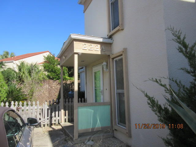 Awesome location for those who love the sea, sand and Florida living. Right across the street are the beautiful beaches of the Gulf of Mexico. Spacious 2 story TH. Master bedroom and bath 2nd floor with second bedroom and bath down. This great TH comes with washer and dryer and the upstairs covered balcony adds additional living space to entertain.