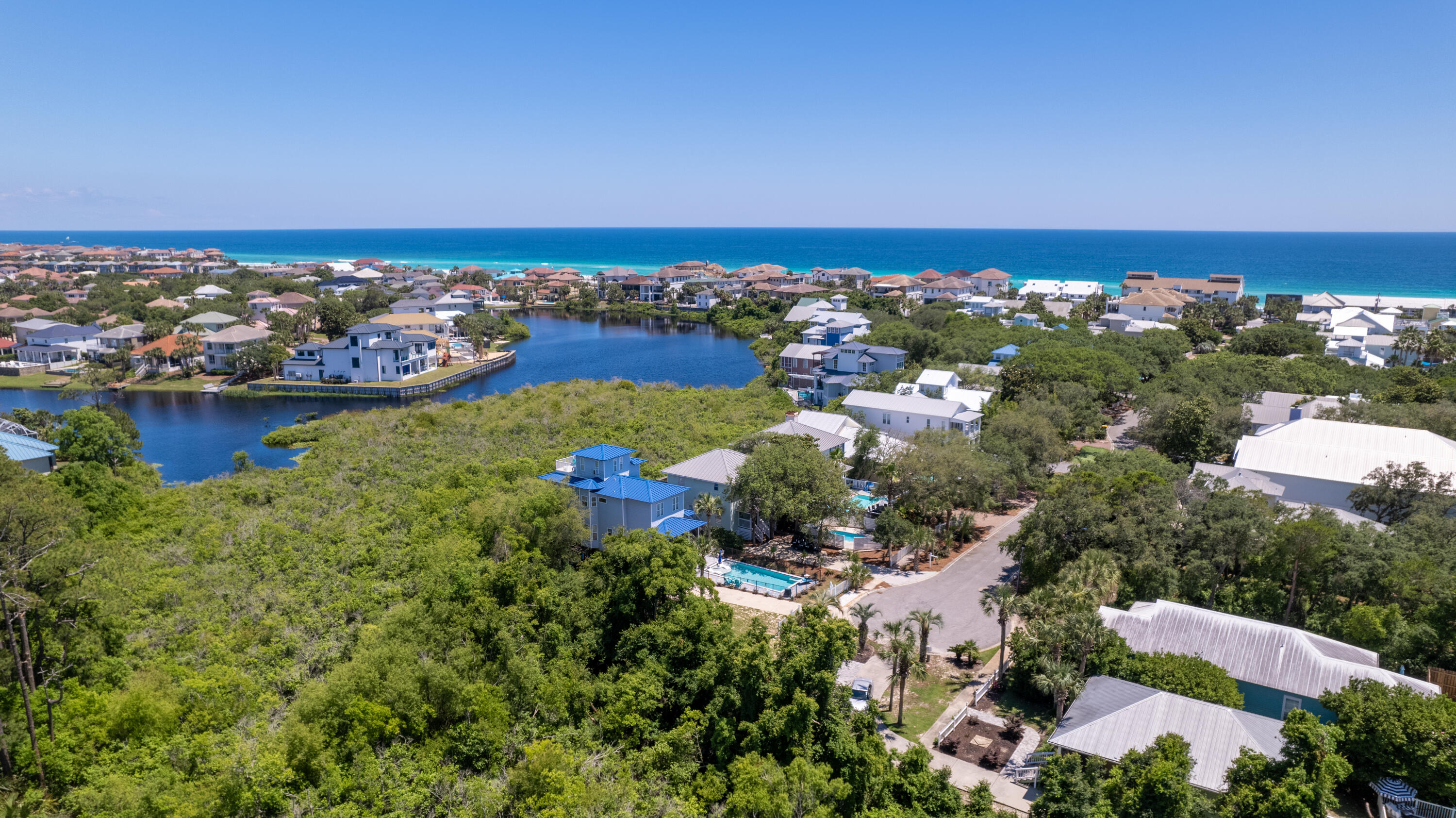 Don't miss out on the chance to own a stunning Destin beach retreat at 85 Sunfish in the coveted Crystal Beach area. This gem offers deeded beach access and impressive rental projections making it an unbeatable investment opportunity.

Situated just moments from the Gulf of Mexico, enjoy your own private slice of paradise with uncrowded beaches accessible via your exclusive deeded beach access. 
Nestled in the tranquility of Crystal Beach, this vacation haven sleeps 12 guests across 4 bedrooms and 2 1⁄2 bathrooms, perfect for accommodating large families or groups.
The open-concept layout invites seamless gathering and entertaining, while the expansive deck adds an unparalleled outdoor space for enjoying quality time with loved ones. Overlooking Destiny West Lakes, soak in lake views and stunning sunrises from the comfort of your living room and two upstairs bedrooms with balconies.
With many recent updates from paint to decor, this coastal retreat boasts a serene interior with a modern coastal vibe. The master ensuite offers a spacious sanctuary, with a private deck while the private fenced pool with newly installed heater makes the perfect sanctuary for children and privacy for adults soaking up the sun.
Parking is a breeze with space for up to four vehiclesa rarity in Crystal Beachalongside a convenient under home shed for bikes, chairs, and beach essentials. Tucked away at the end of a peaceful dead-end street, relish in the serenity with no noisy neighbors or bustling crowds in sight.
A leisurely 5-minute stroll takes you to the pristine shores, bordered by picturesque white picket fences and swaying palms. Nearby, a newly paved walking path beckons exploration, offering access to an array of restaurants, shops, and golf courses along the scenic beach road.
With its prime location and irresistible charm, 85 Sunfish is a coveted retreat that won't stay on the market for long. Schedule your showing today and make your Emerald Coast beach dreams a reality!