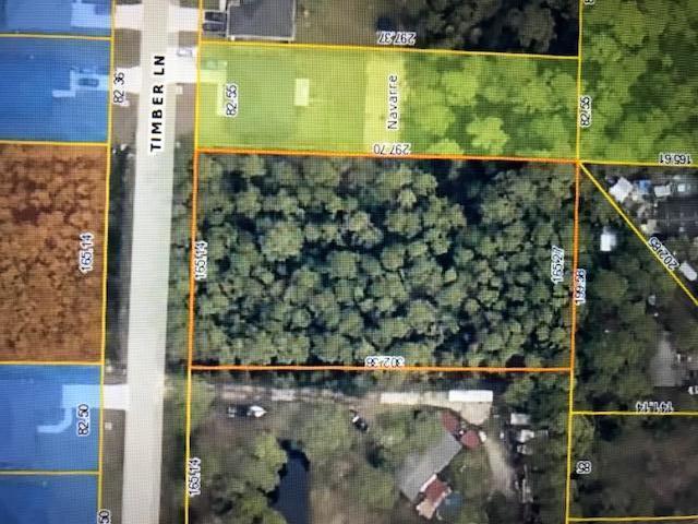 Build your dream home in one of Navarre's most outstanding and beautiful neighborhoods! This spacious lot is 1.125 acres in size with many beautiful trees for privacy. Conveniently located to schools, shopping, military bases and of course the BEACH!!!