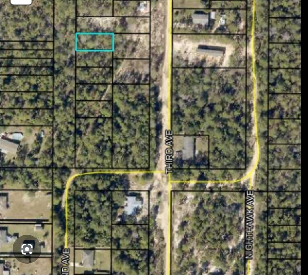 Mostly cleared lot to fit a mobile home.