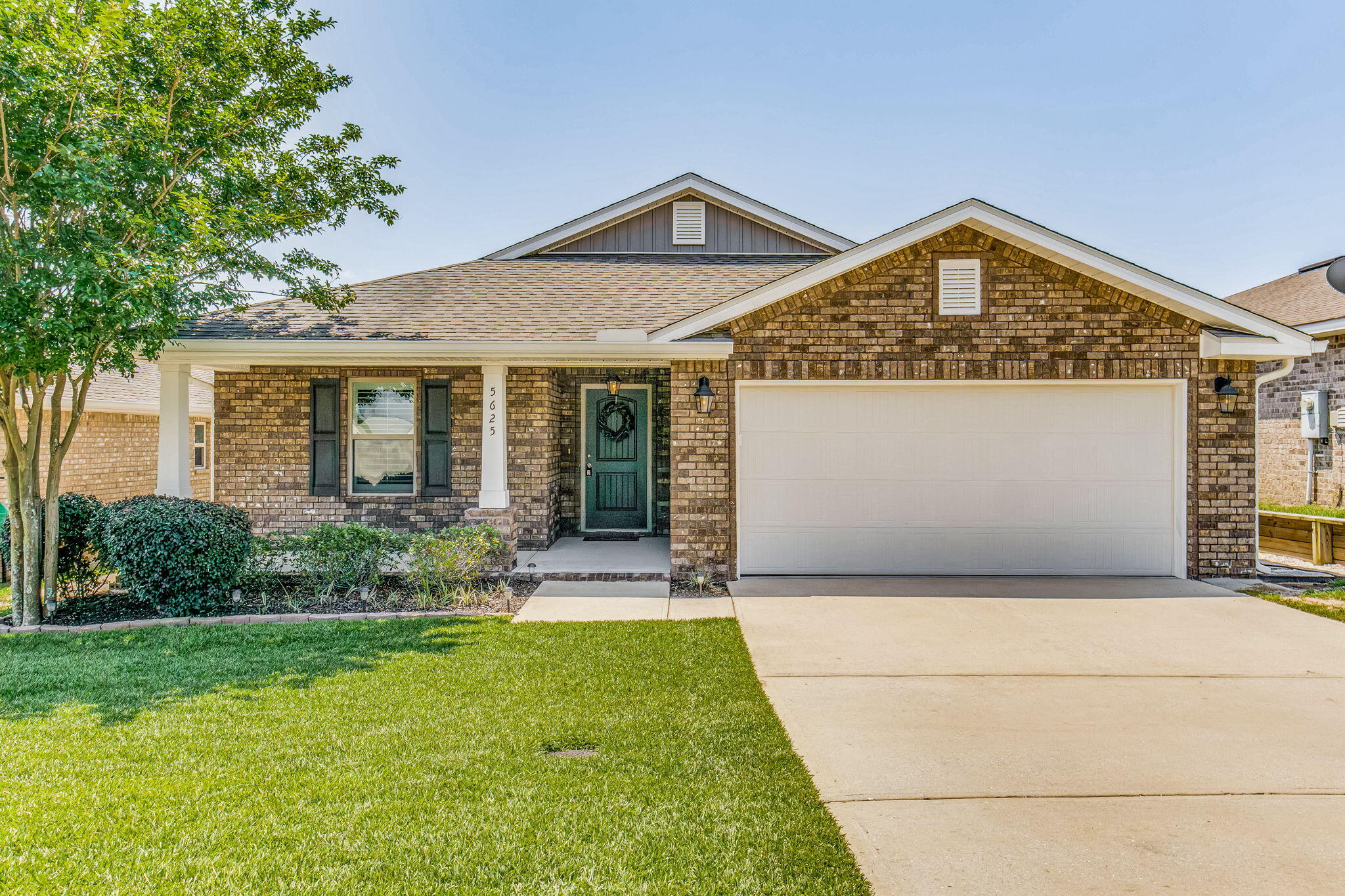 Welcome to your dream home! This meticulously maintained residence boasts an array of upgrades and features that surpass those found in new builds. From practical amenities like GUTTERS and a SPRINKLER SYSTEM to luxurious touches such as PLANTATION SHUTTERS and a spacious 10X16 COVERED PATIO, this home offers the epitome of comfort and convenience. Step inside and be greeted by a spacious tiled foyer, setting the tone for the elegance that awaits within. To the left, you'll find two generously sized spare bedrooms and a well-appointed spare bath. Convenience is key in this home, with the laundry room conveniently situated off the foyer to the right, adjacent to the garage entrance. As you continue down the foyer, you'll enter the heart of the home: a stunning open kitchen that will delight even the most discerning chef. Tall cabinets, stylish backsplash, and granite counters create an atmosphere of luxury, while stainless steel appliances offer both form and function. On the opposite side of the home, you have the primary suite. Featuring a tray ceiling, separate shower and soaker tub, double vanity with granite counters, and a spacious walk-in closet. But the luxury doesn't stop indoors - step outside to discover your own private oasis. The backyard is beautifully manicured and low-maintenance, allowing you to spend less time on yard work and more time enjoying the things that matter most, whether it's lounging in the sunshine or heading to the nearby beach. Location is key with shopping only about 15min away, Pensacola 20min, Beach 30min and NAS and Hurlburt Field about 40min. Schedule a private tour today and make this exquisite home yours!