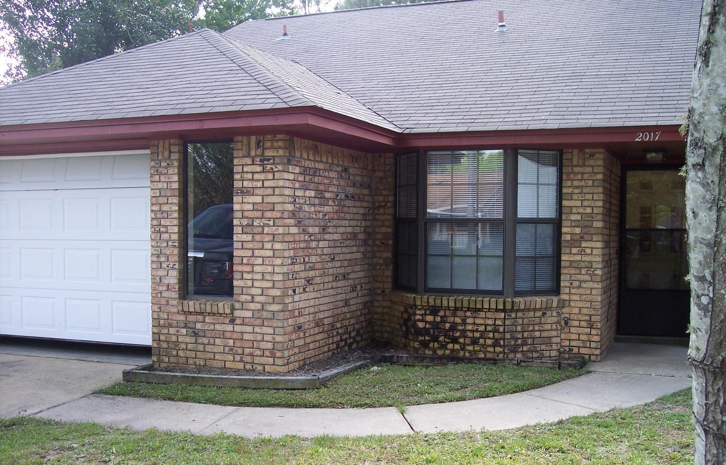 A great starter home tucked away on nice little cul-de-sac near the Eglin Reservation. Plenty of kitchen cabinet and counter space with stainless side by side fridge with ice/water in door; breakfast bar; tinted french doors from dining room to side patio; wood burning fireplace in LR with cathedral ceilings; 3rd bedroom up at front of house and can be used as office; HUGE privacy fenced back yard; master bedroom has sliding glass doors that open to back patio. Small cat or dog allowed with non-ref pet fee. Available April 17.