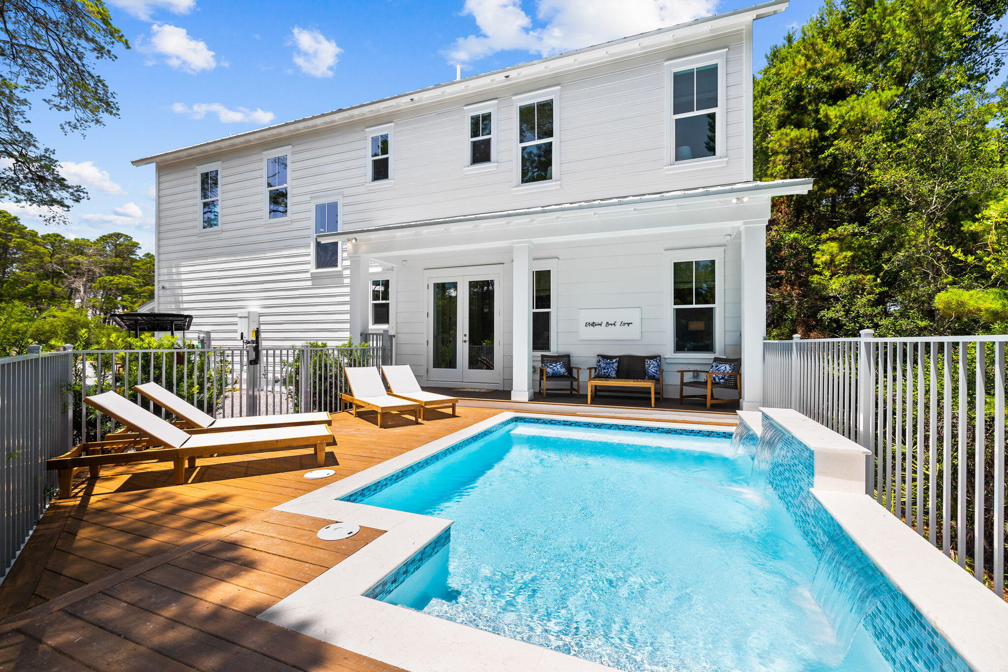 Unicorn investment properties like this are rare. Generating over $158K in rental actuals in 2025 and already $55K on the books for 2026, this 8% cap rate investment gem with no HOA, a private pool and .5 miles to multiple beach access points on 30A, this property checks all the boxes! Surrounded by nature and tucked away on a quiet cul-de-sac on the west end of 30A, this custom-built, two-story beach home offers the perfect blend of coastal elegance, privacy, and investment potential. Completed in early 2023, this property has consistently outperformed rental projections for the past two years with consistent five star reviews and repeat guests who return each year. Designed with refined, coastal finishes, this luxe home features 10-foot ceilings, custom shiplap and an open, airy feel.  Tucked away on a private cul-de-sac and surrounded by nature, this beach home creates a peaceful, serene setting for the ultimate beach vacation. The first floor private ensuite bedroom and open living, dining, kitchen area and powder room is perfect for comfort and convenience. Three additional bedrooms, three baths, bunk room alcove, separate living/lounging area offers plenty of space for families and guests to comfortably spread out in style. Three expansive porches, including two on the front of the home and a private poolside deck, invite effortless indoor-outdoor living. A private pool with water feature is framed by mature trees perfect for lounging or entertaining. Whether searching for a full-time residence, a second home, or a proven short-term rental, this property deliverswith over $142K in rental income in 2024,  $158K+ in 2025 and $55K already on the books for 2026, this is a true money making investment opportunity. With no HOA, this turnkey, income-producing vacation retreat offers savvy investors maximum income and appreciation potential. Whether you're looking to diversify your investment portfolio or purchase a legacy home for your family to enjoy, 213 Spotted Dolphin is a rare opportunity on 30A and the Emerald Coast. 

Buyer to verify all dimensions. Contact listing agent to schedule a private showing or for additional information.