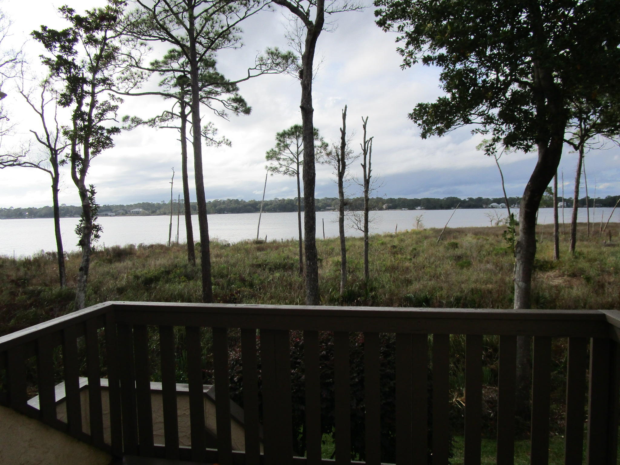 Enjoy the one of a kind view of the Bay from the deck, living room, dining room, and master. Lovingly maintained 2 bedroom 2 and a half bath town home minutes from the Bluewater Marina. You'll love the updated kitchen, granite counter tops complete with all the appliances including the washer and dryer. Loft area over living room is perfect for an office space. Master bedroom has built in headboard area with extra storage, uplighting and reading lights. Enjoy waterfront living without the hassle of any yard maintenance. Available December 1 for $1800/month. Sorry, no pets and no smoking allowed. Call today for your showing appointment.