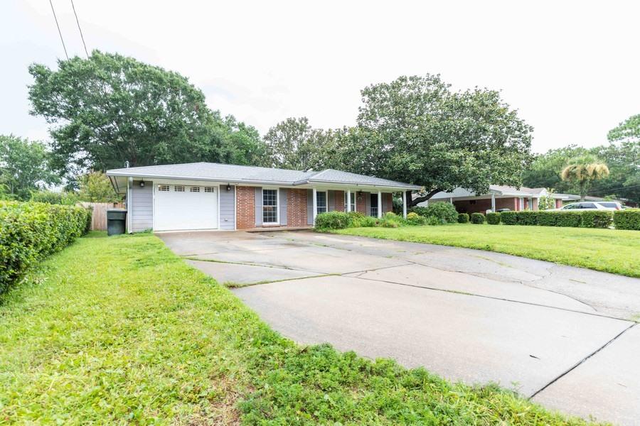 This home has everything! Pool, garage, updated, matured yard,& backs up to the school. The neighborhood is quaint and has a park within walking distance. The pool is salt water gunite and a detached hot tub to top that off! Within the last 5 years the back porch roof was raised to add an architectural design and to really accent the back yard oasis. The hot water tank is newer, a.c. regularly maintained, and the attic has extra insulation to top it off! It's a must see!!
