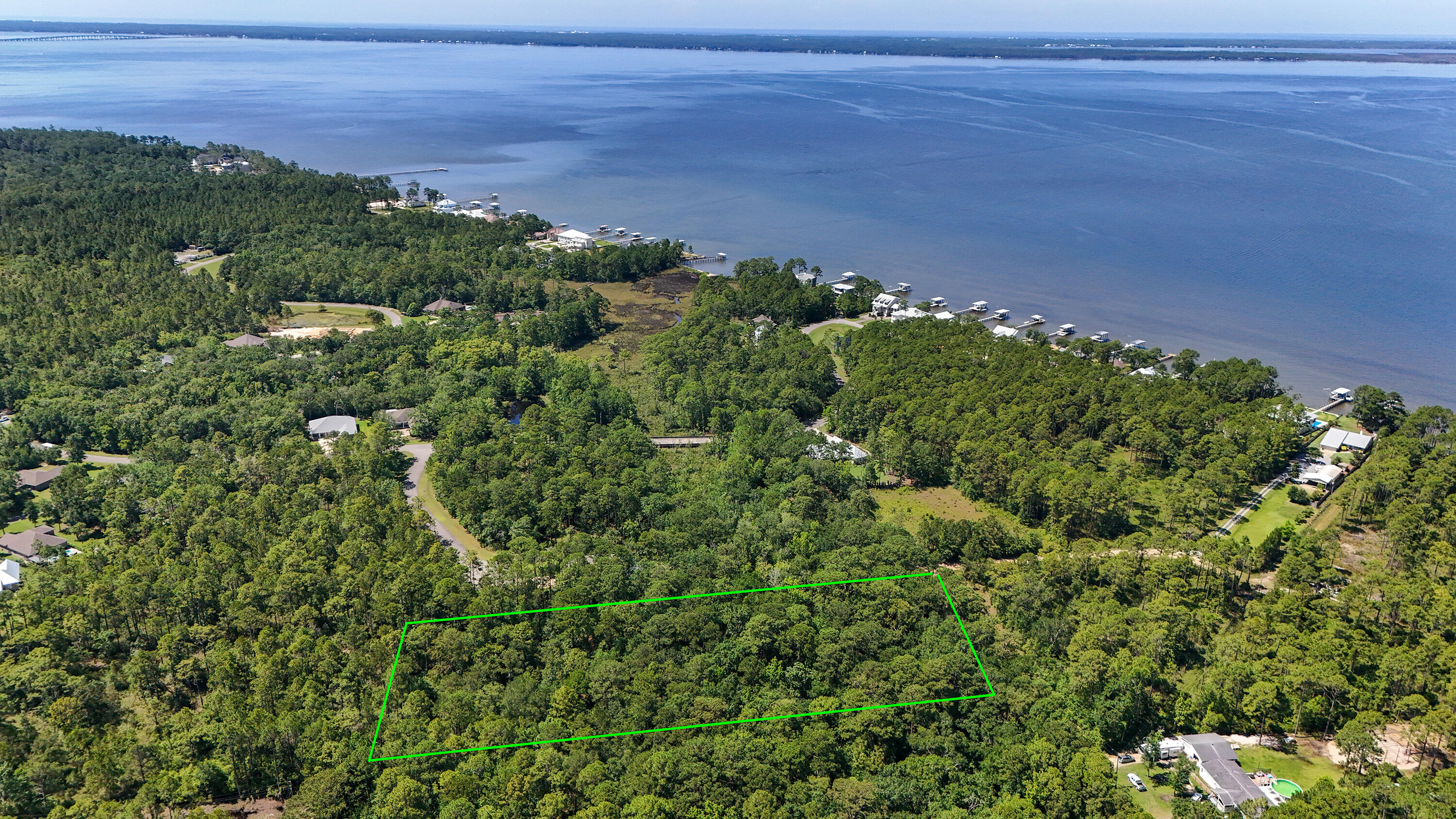 Discover the perfect blend of natural serenity and convenience with this stunning 4.66-acre wooded parcel on Watson Road in Freeport, Florida. Nestled right off Bay Loop Road, this picturesque property offers a serene escape surrounded by the beauty of Florida's lush landscapes. Whether you dream of building a private residence tucked away among nature or envision developing a tranquil retreat, this land provides an ideal canvas.

Surrounded by mature trees and abundant wildlife, this property offers ample opportunity for outdoor activities and exploration. Imagine waking up to the sound of birdsong or spending your evenings enjoying the peaceful ambiance of your own wooded sanctuary. Despite its secluded feel, this property is conveniently located near local amenities, schools, and just a short drive from the emerald waters of the Gulf Coast.

Don't miss this unique opportunity to own a substantial piece of land in the growing community of Freeport. Whether for personal use or investment, this property is a prime piece of real estate ready to accommodate your vision. Contact an agent today to explore this beautiful acreage and discover the endless possibilities it holds!