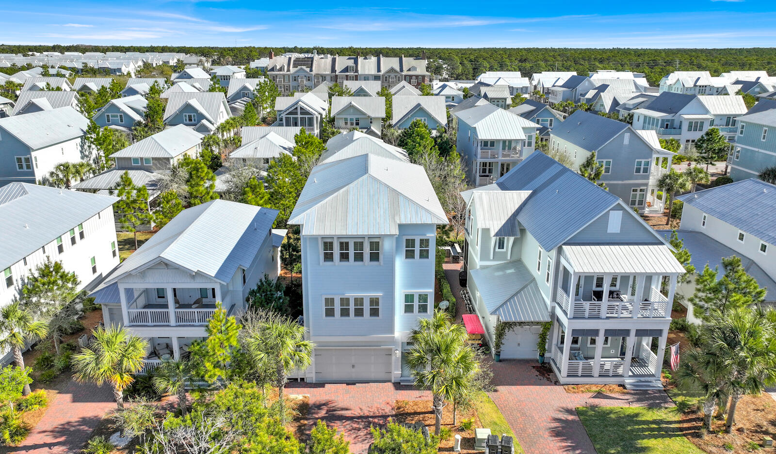 Just a short stroll from the exclusive members-only Watersound Beach Club, this coastal retreat enhances its appeal for those who cherish access to premier amenities. This beach house is an ideal sanctuary for those seeking a luxurious, convenient, and relaxing coastal lifestyle. Beautifully decorated and meticulously crafted, the home embodies the essence of Southern living and beachside relaxation with features that showcase an unwavering attention to detail and high-quality craftsmanship, including shiplap and crown molding, 8-foot doors, and 10-foot ceilings.
Large windows and porches on all three levels bathe the interior in natural light and offer ample opportunities to savor the picturesque views. An elevator ensures easy access to all floors, making it a convenient choice for those needing mobility assistance. The residence includes four bedrooms, featuring two master suites, one located on the first floor and another on the third, providing both flexibility and privacy for occupants or guests. The chef-inspired kitchen and expansive great room create a perfect environment for entertaining. Additionally, this home comes fully furnished, offering a turnkey solution for those looking to move in without the hassles of furnishing a home.
Located within the Prominence community, residents enjoy access to resort-style pools, a fitness center, and just minutes to the nearby Deer Lake Park Beach Access. The home's proximity to The Big Chill offers convenient access to additional shopping, dining, and entertainment options, further enhancing the convenience and appeal of this exquisite coastal home.