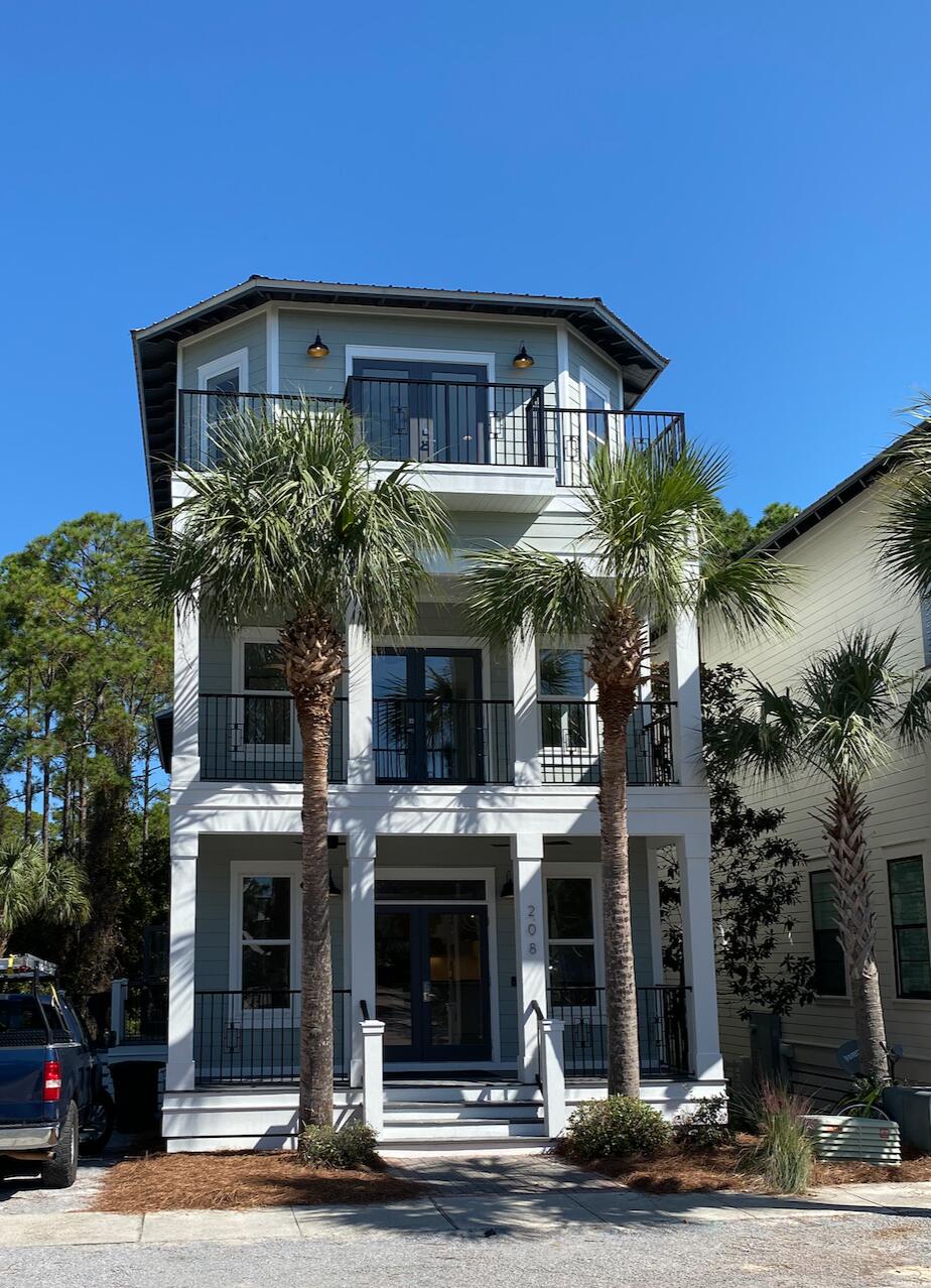 NEWLY REMODELED FROM TOP TO BOTTOM! This 9-month remodel project is wrapping up now.  If you're looking for new construction in Seacrest but can't find what you want, this one's for you!  No stone unturned in  this high end beach house remodel.   New A/C units, flooring, cabinetry, bathrooms, kitchen with Viking appliances - all new!  Paint inside and out.  New designer lighting and fans. All new appliances. This luxury beach house features 6 outdoor porches, including a 3rd floor SUNSET VIEW!   Backs up to the protected nature preserve and walking trail for a view that will never disappear.  3 HUGE bedroom suites for the adults - each fits a King Bed with sitting area. 3rd floor kid's suite features a giant bunk room,  kid's living room, and an additional game room/loft & wet bar! Expansive 10 foot ceilings and 8 foot doorways bring this home up to modern design standards!  All porches re-coated in waterproof sealant with new exterior railings!  Come see this amazing home in the quiet section of SEACREST BEACH!