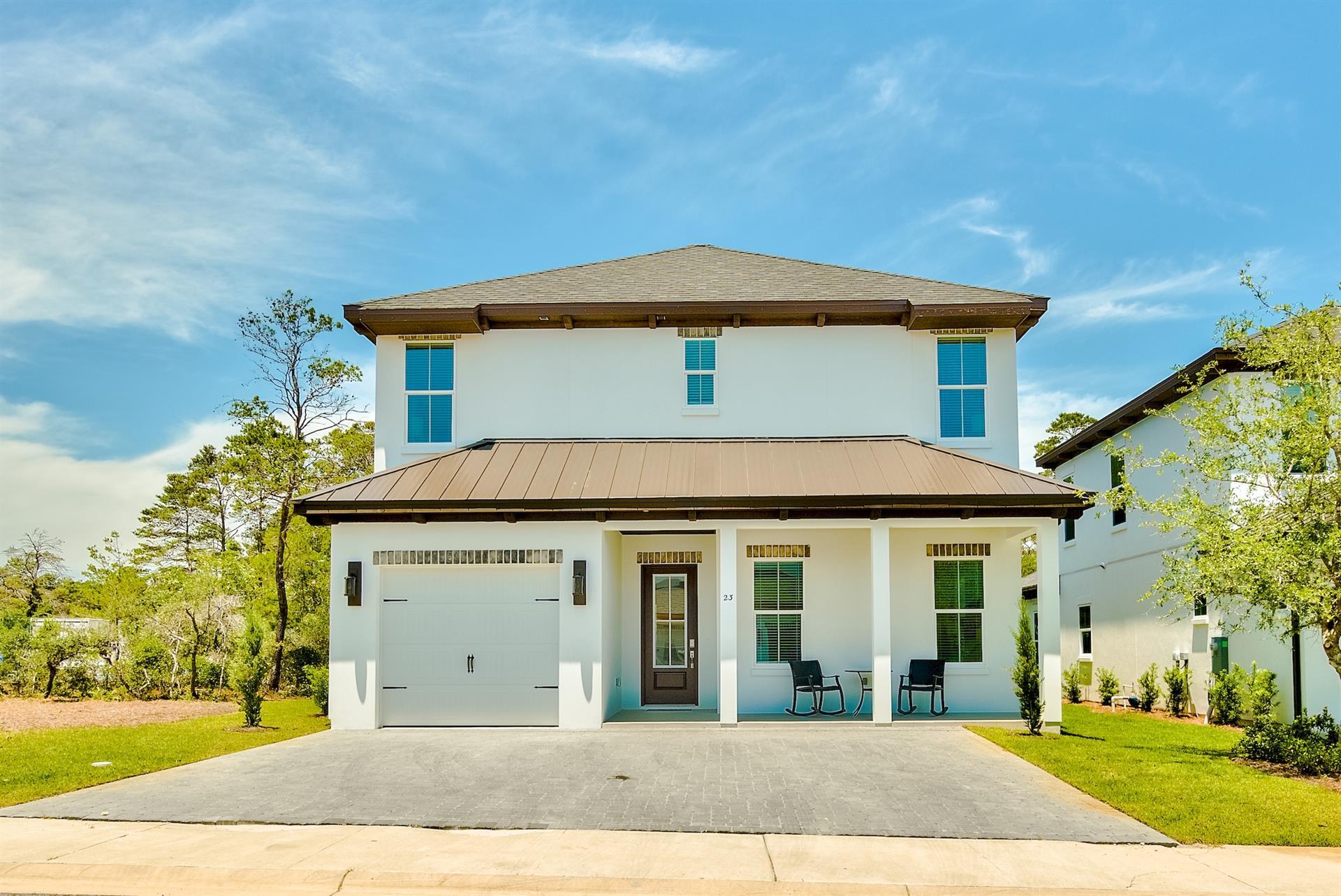 Talk about a perfect location - Welcome to Carefree L'Attitude! This home is walking distance to the beach and tucked away on a corner lot for those looking for more privacy. The home has TWO master bedrooms, one on each floor, two guest bedrooms and a custom bunk space on the second level. Shiplap accent walls, upgraded appliances, and professionally decorated designer furnishings highlight the interior of this home. An ideal investment opportunity with a proven rental history exceeding $90K in its first year and actual gross rental income of $99K this year from a local management company with multiple homes on the street. Once you open the sliding glass doors and step out onto the covered patio, you are presented with an entertainer's dream. The backyard boasts a  built-in gas grill, outdoor lounge area, and a private pool complete with a gas heater. From Carefree Lane, you are just north of Gulf Place and the Ed Walline Beach access on 30A, with multiple restaurants (Shunk Gulley, Local Catch, etc.) coffee shops & entertainment venues within a short proximity.