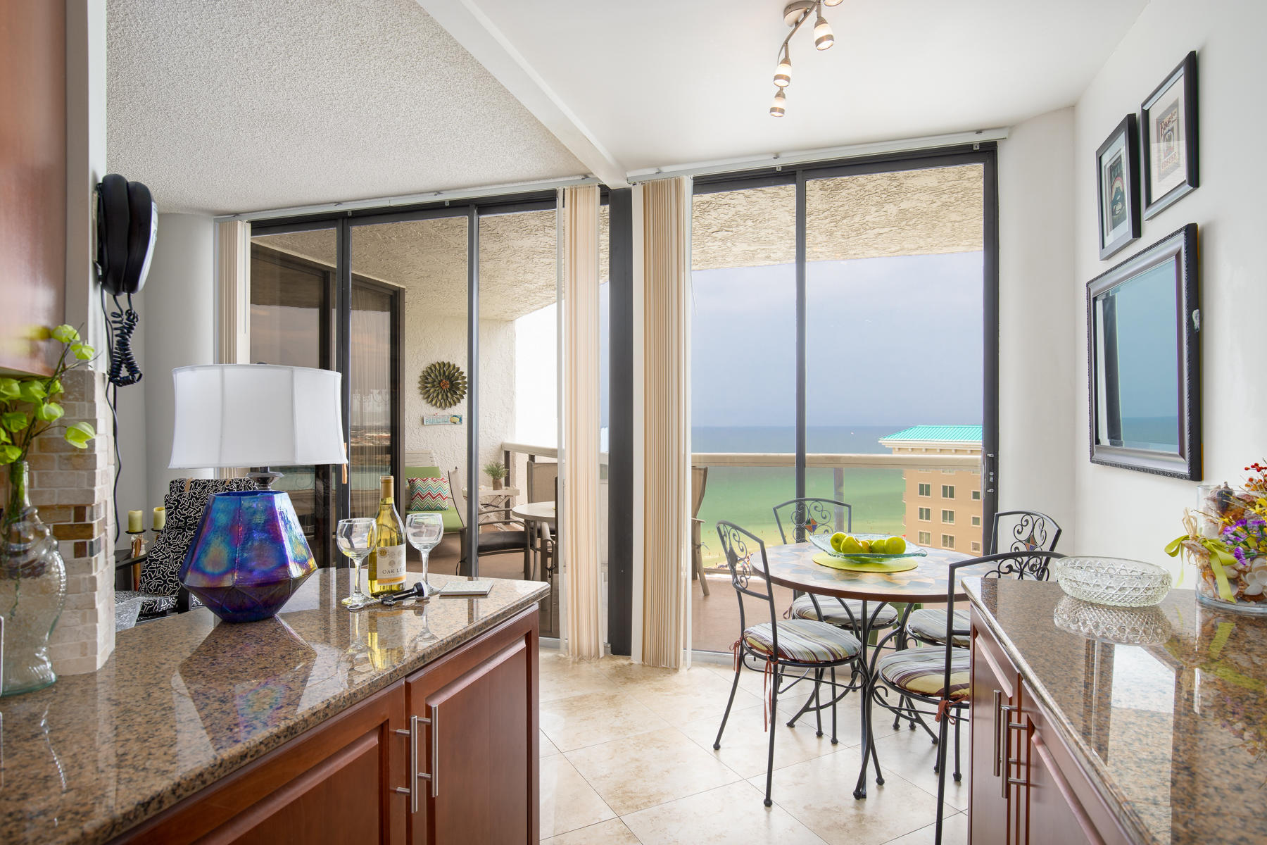 This immaculate 2 bedroom / 2 bath unit has absolutely amazing views and breath taking sunsets from the 14th floor balcony! Renovated galore. A beautiful kitchen with granite counter tops, stainless steel appliances, and gorgeous cabinetry leads into a fantastic living area. The unit was professionally decorated and all furnishings convey. Resort amenities include a large sun deck, beach walkover, heated pool (seasonally), sauna, 2 hot tubs, outside shower, baby pool, basketball courts, picnic tables, and outside grills. *All room sizes are approximate and are to be verified by buyer.
