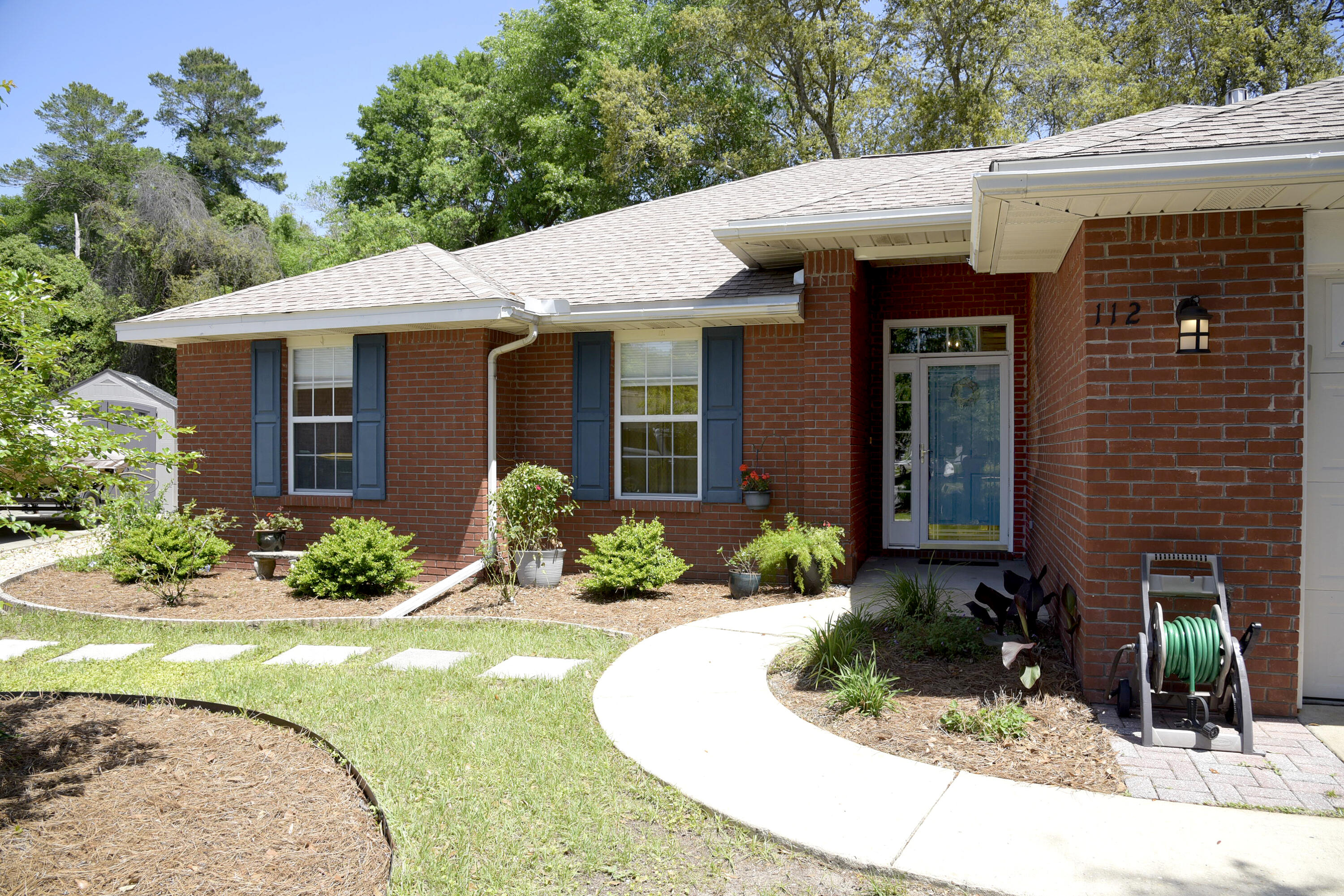 Open House Saturday April 30th from 1:00pm to 4:00pm. Come see this beautiful brick home with an oasis in the back! These homeowners have made this ranch style home into a relaxing and updated place to call home. An open floor plan welcomes you and invites you to spend your warm evenings lounging in the Florida room looking out onto beautiful palms, or roasting marshmallows over the fire pit while you enjoy the covered sitting area. LVP floors sprawl through the home making it feel open and airy, while updated bathroom fixtures and primary bath barn door add a modern feel. If you're looking for some fun activities, you barely have to leave your back gate to access the wonderful amenities of this location. Baseball fields, tennis courts, skate park, and library are just a few of the options available to you! Garage refrigerator will not convey, new roof 2019. Don't wait, this one will not last!
