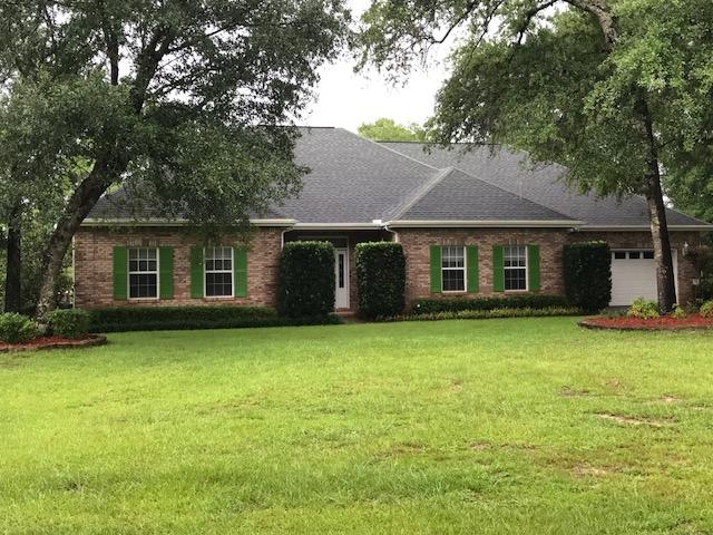 IMAGINE YOUR OWN PRIVATE ISLAND  582 Feet on an 8 acre, fresh water, spring fed lake; fish from your own dock! Located at the end of a cull-d-sac and bordered to the South by a large wooded undeveloped tract. All Brick Home, built for and by the present owner features all Galvanized metal stud and roof truss construction; 8 exterior walls, filled with cellulose insulation for energy efficiency, then wood sheathing and brick! Lots of coin corners, lots of details only an owner/builder would take the time to do - like bull nose corners, tons of built-in shelving  unique lighting, access panels for convenience to servicing the Gas Logs, Cable and internet wiring to name a few.. House has over 2700 SF 3/2 but with large office that has a pull-down Murphy bed could be 4th BR! This This house was built for ultimate enjoyment and entertaining, with so many custom cabinets with granite tops, storage units and built in appliances which include down-draft Range, trash compactor, dishwasher, microwave, and Refrigerator with ice/maker! Then there's the large screened porch overlooking the beautiful lake!     BUT WAIT â€“ a 640 SF Apartment at the end of the 40 X 60 Metal Barn (40' X 16') that has one BR, 1 BA.   This is fully equipped with even a washer and dryer.  This apartment is currently rented â€“ please look at photos.  Do not want to disturb the tenant until absolutely necessary!  There is storage area over the apartment area, with access by stairs. .  ADDITIONALLY there is a 12' X 60' Side compartment to store an RV, Boat, or tractor.  Eave height on the metal building is 12 feet.  This was used as a cabinet shop, but could be many, many different uses â€“ exterior walls are the load-bearing so partitions can be added wherever.  Same is true for home â€“ exterior walls are load-bearing.  Home features security system, sprinkler Sys. for yard with water pulled from lake â€“ variety of native trees  for shade â€“ AND large beautiful blue-berry bushes!    There is only one large septic tank that services both the house and the apartment.  There are two pro-pane tanks â€“ one for gas logs in home, another large one near the Metal shop that are owned by this owner.  This property has rights to all amenities of Lake Arthur Estates, but no requirement to pay HOA Dues  SHOWN AS 4 BR AS LARGE OFFICE HAS A MURPHY BED AND CAN BE AN OFFICE, OR BEDROOM