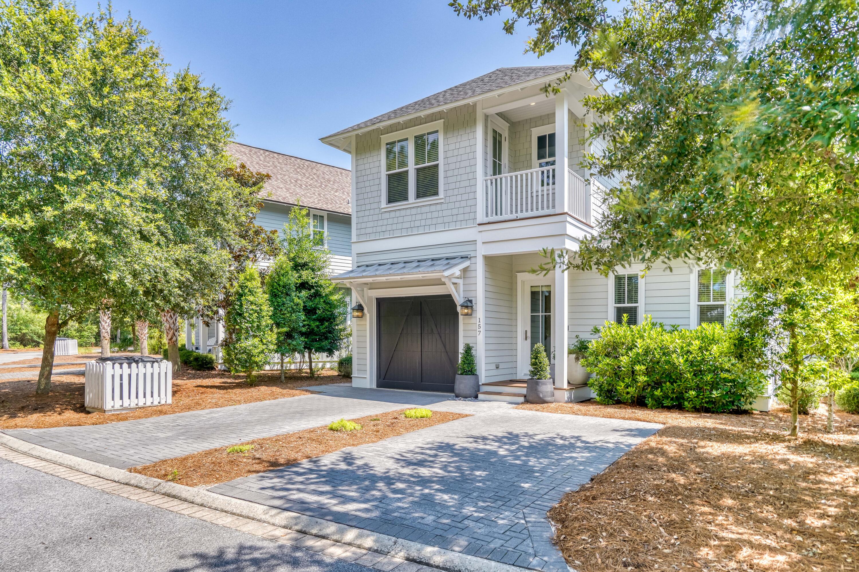 A beautiful, private WaterSound West Beach retreat that offers 4 bedrooms + bunk room/office, 3.5 bath, with a front porch facing green space and double back porches overlooking the quiet, idyllic Horseshoe Park. All this within close proximity of the private community beach access. Features include 10 foot ceilings on main level, sound system with in-ceiling speakers,
hardwood floors, shiplap in hall/entry foyer area, custom cabinetry with easy glide doors/drawers, under cabinet lighting in kitchen, and stainless steel KitchenAid Appliances. Single owner and never rented, this house has 3 master-size bedrooms. Junior master bedroom on main level, the second level offers master bedroom, additional oversized bedroom, a guest bedroom, and a bunk room/office. Ready for you and your guests, this home includes furniture (with some exclusions), TVs, brand new HVAC system, outdoor shower, tankless water heater and a one car garage for your golf cart. Nestled among the greenery and trees, this perfect tranquil oasis offers something for everyone, beach and nature lover alike. Enjoy the tranquil setting of Horseshoe Park from the two covered porches. Take one of the multiple paths and bridges to other community green spaces, the community pool and the beautiful emerald green waters of the Gulf of Mexico. WaterSound West Beach borders Deer Lake State Park and offers one of the most private and secluded areas of beach along Scenic Highway 30-A. The gated community offers 24 Hour Security, 1 mile of Sugar White Sandy Beaches and Emerald Waters, Towering Dunes, Resort style community pool, clubhouse, outdoor grill, fireplace, gym, and more. The exclusivity and tranquility make this a much desired location. Centrally located to the best dining, unique boutique shopping and biking and walking paths. Easy access to Hwy 98, allowing you to explore the nearby cities of Destin or Panama City Beach, as well as, the Northwest Florida Beaches International Airport. As a resident of WaterSound West Beach owners may purchase membership to the exclusive WaterSound Beach Club and two Private Golf Courses. Ask for more details.