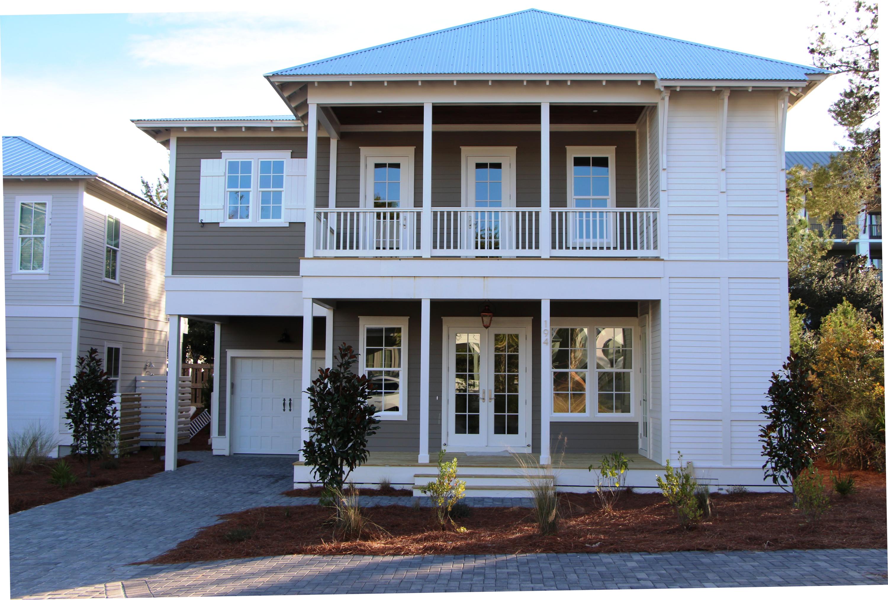 Gorgeous new construction in quiet Blue Mountain Beach just a short walk to the beautiful white sands and emerald waters of the Gulf. This Florida cottage has 4 bedrooms and 4 full baths with a powder room and bedroom on first level. Ship lap wall accents adds to the coastal feel of this family retreat or private residence. It would also be a great rental property. Real hardwood floors throughout, granite counter tops, stainless appliances, upscale lighting including front entry gas lantern and designer tile are all part of this home. An extra large tiled laundry room on the second floor. Lakeside Subdivision has its own pool, clubhouse and workout center. Blue Mountain beach is close to restaurants, biking and walking trails and only a few miles to Seaside and Grayton Beach.
