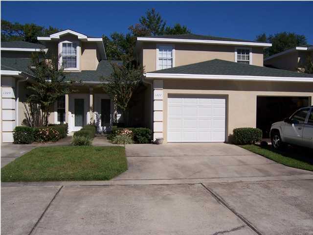 Very nice Furnished Townhouse in quiet area close to Beaches, Shops, Schools and Bases. Tile flooring in Entrance Foyer, Dining/Kitchen and Baths. Carpet in Living Room and all Bedrooms. Kitchen is large and open to Dining Area. All appliances included. Open, Airy Living Room with Sky Lights. Master Bedroom Downstairs with Master Bath, double Vanity, Separate Shower and Garden tub. Walk in Closet. The other Two bedrooms are upstairs and share Full bath. Home as a Patio off back. Stackable Washer/Dryer in Utility room. NON SMOKING, NO PETS. CLOSE TO EOD SCHOOL.