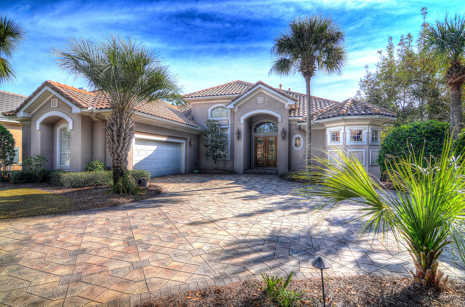 Appraised for $1,050,000 on 5/18/17. Stunning custom home within the award-winning gated, golf community of Regatta Bay! PREMIER LOCATION on the 15th fairway with panoramic golf course and lake views. This home has been meticulously maintained by the original owners. Features include HUGE screened in pool/spa area with outdoor kitchen, second floor bonus room with large balcony overlooking golf course, two master suites with double vanities and walk in showers, open floor plan with tile floors, granite countertops, custom cabinetry and tray ceilings. Open kitchen concept includes cafe nook and gathering room. Separate, home office with golf course views. Golf cart to marina, shopping, dining and entertainment. White sandy beaches within a mile. Buyer to verify all fees and dimensions.