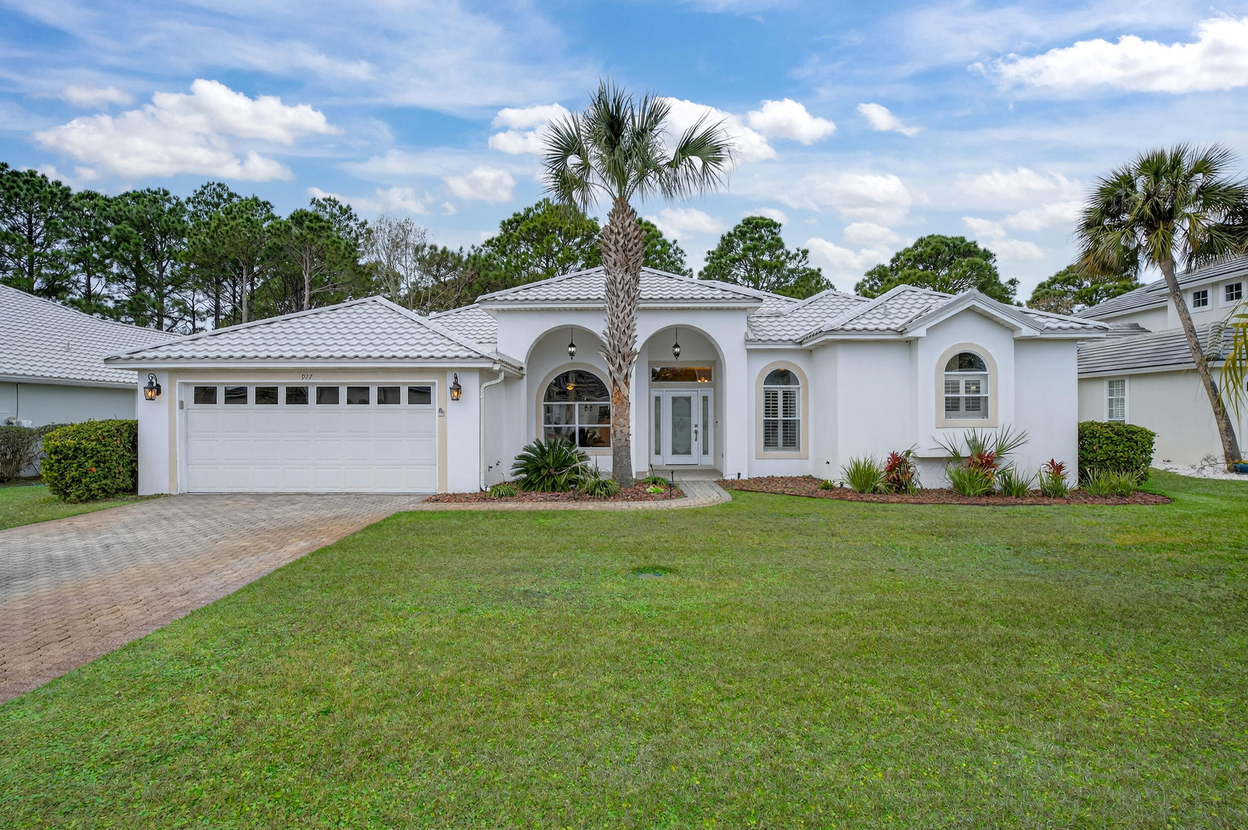 $30,000 PRICE REDUCTION AND BIG FLOORING ALLOWANCE TOO!! Located in Destin's highly desirable Emerald Bay Golf Community, this warm & lifestyle driven 3-bedroom, 2-bath home with separate office offers comfortable coastal living in a prime Destin location. The popular split-bedroom floor plan provides privacy & functionality for everyday living & hosting guests. Inside, you'll find plantation shutters, newer Samsung appliances & lots of cabinet space with granite in the kitchen. One of the home's standout features is the 377 square foot heated/cooled sunroom which perfect for year-round enjoyment & makes the square footage total 2,539.....ideal for relaxing, entertaining or use as additional living space. Did we mention BRAND NEW ROOF.... brand new metal roof adds long-term value. Situated in a golf community on the bay, residents enjoy a scenic setting with convenient access to Destin's beaches, dining, shopping, and entertainment. This home offers an excellent blend of comfort, durability, and location! Low HOA fee....$254/quarter and in X Flood Zone!