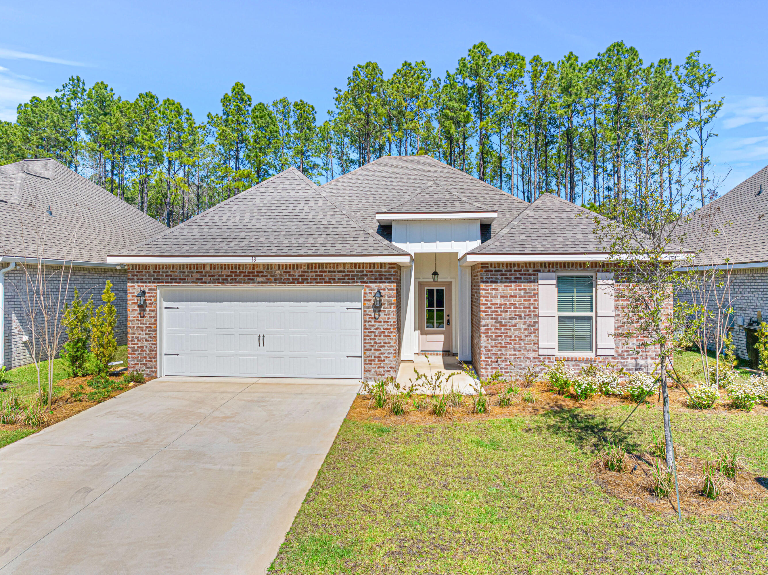 NO CARPET! MANY UPGRADES! TV'S IN EVERY ROOM. This is a NEWLY CONSTRUCTED HOME in the much sought after community of Hammock Bay, Freeport, Florida. Walking paths throughout this area and easy access to PICKLEBALL and SWIMMING as well as HIKING and BIKING trails make this your BEST choice. New Amenities are walking distance. This open floor plan offers three bedrooms, two full bathrooms and an open concept layout. This single-story home offers a remote primary suite, covered back porch, sizable laundry room and two car garage. Light and bright, beautiful quartz countertops throughout add a luxurious and modern feel. The open concept kitchen makes this a great entertainment oasis that flows easily to the covered porch with views of the nature preserve out back. Come see this one today!