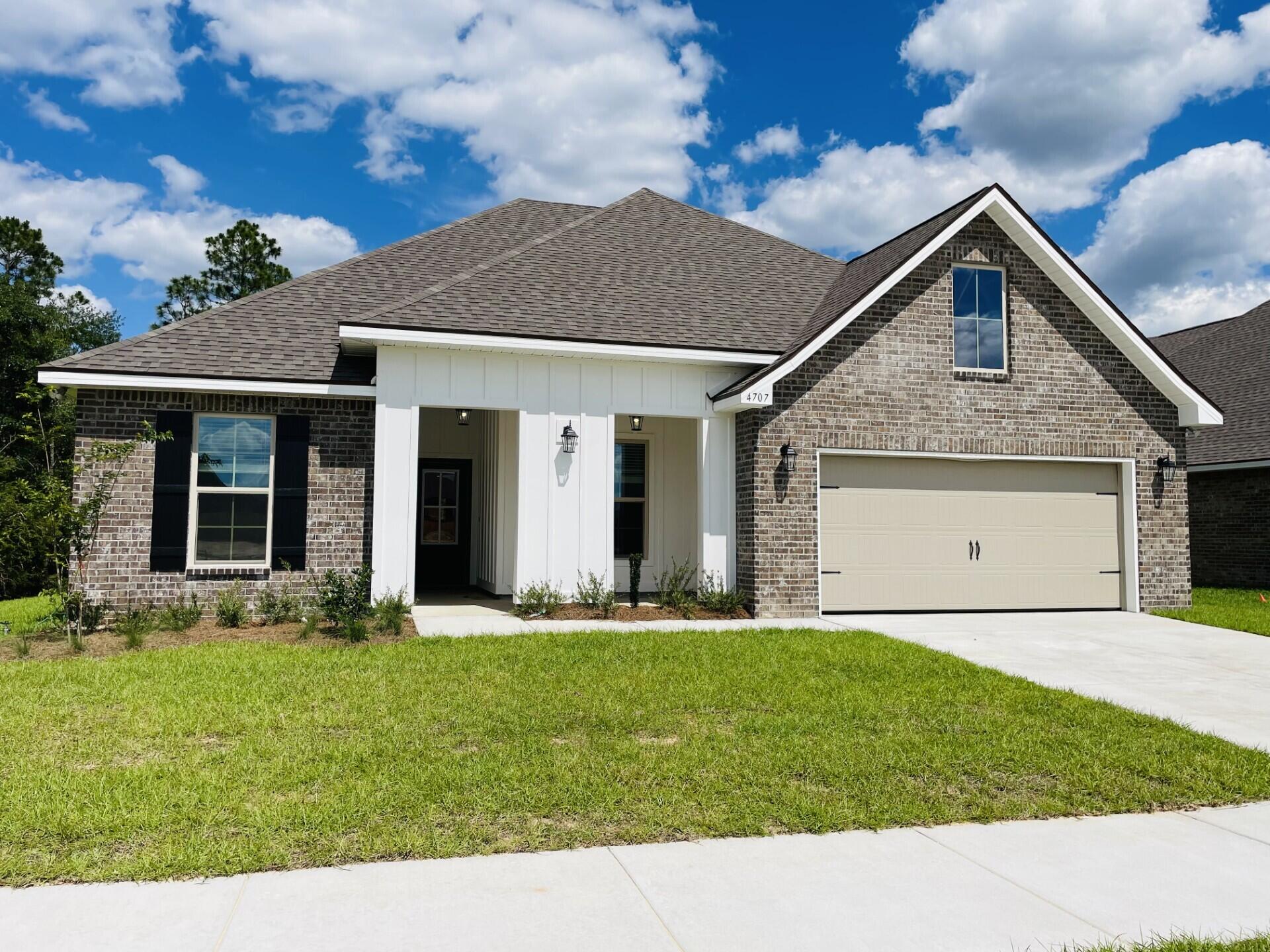Awesome Builder Rate Incentives!  (Restrictions apply) 

The HICKORY III G in Patriot Ridge community offers a 5 bedroom, 3 full bathroom, open design. Upgrades added (list attached).
Features: double vanity, garden tub, separate shower, and walk-in closet in master suite, double vanity in all other bathrooms, den, formal dining room, covered front and rear porches, boot bench at garage entry, recessed lighting, crown molding, ceiling fans in living room and master bedroom, smart connect Wi-Fi thermostat, smoke and carbon monoxide detectors, landscaping, architectural 30-year shingles, flood lights, and more!
Energy Efficient Features:  electric water heater, a kitchen appliance package with a electric range, vinyl low E MI windows, and more!