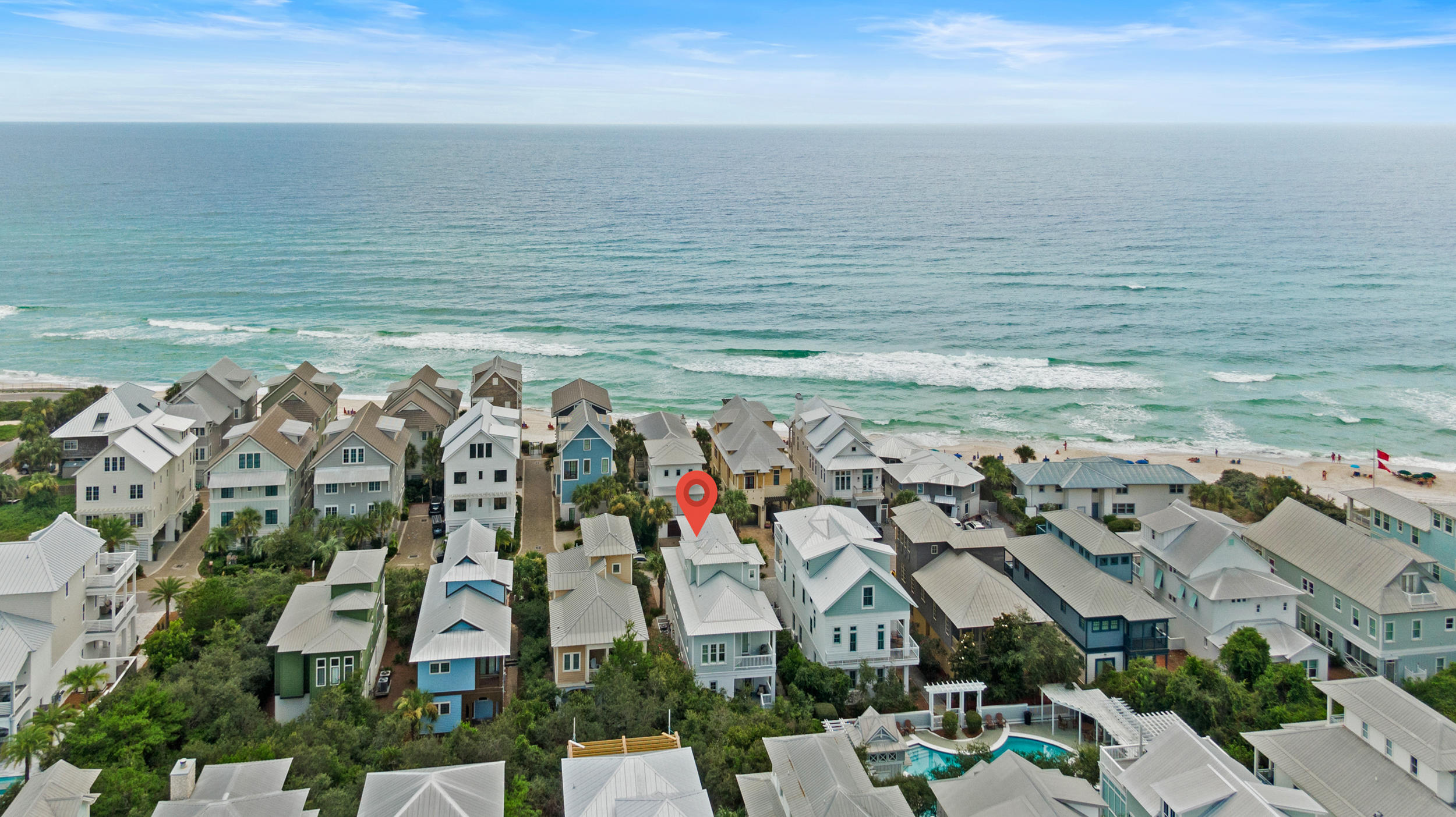Find stunning Gulf views in this 5 bedroom and 5 bathroom recently renovated and move in ready home. Located just one row from the Gulf, and only steps away from Rosemary Beach and the community pool, the location is ideal. This property has great rental projections making it a quintessential investment property or a second home. 
Recent paint inside and out, new furnishings, tile floors in all secondary beds, updated baths, extended driveway, and 1 car garage. On the first floor you will find 3 bedrooms, one with an ensuite and direct access to the back patio, and one with a shared bath and patio access, and a third that doubles as a media room with barn door closure, built in day bed plus a sofa bed. This first floor living space is ideal for guests to have their own private oasis and for kids to have their own additional area.
 The second floor offers open floor plan living with a large chef's kitchen perfect for entertaining suited with stainless steel appliances, double ovens, 5 burner gas range stove, and an island with bar stool seating. The living room is centered around a fireplace to add a sense of warmth and coziness to the space. Windows line the wall to allow for natural light to flood the space. There is a balcony accessible from the living room to add to the entertainment space. Also located on the second floor is a powder bath and a secondary bedroom with en-suite bath. 
The third floor is designated as the master suite oasis including a large enough space for an additional sitting area, a luxurious master bath with a large walk in shower, and a jetted soaking tub. The master suite also features an incredible balcony with Gulf views. You truly can enjoy Gulf views from every inch of this master suite. 

This location provides a great neighborhood feel and while remaining private and serene. Ride your bike or walk to tennis and shops, restaurants at Rosemary or 30Avenue. Very convenient to everything 30A has to offer.