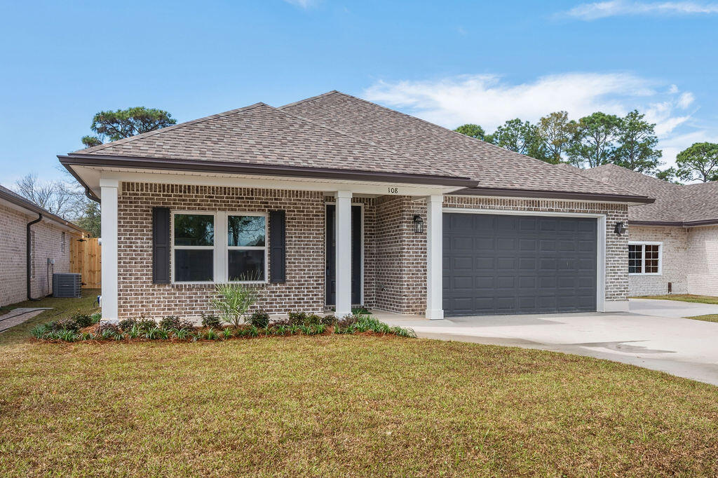 Stunning craftsmanship in this new construction all-brick 3-bedroom, 2-bath home. This modern home features 1,905 sq.ft. with high-end custom finishes and exceptional detail. Get settled into a neighborhood less than 2 miles East of Bluewater Bay and the Mid-Bay Bridge surrounded by new construction! This move in ready home blends timeless quality with today's most desired features, creating a home that is as functional as it is beautiful. Entering the home, you have an oversized foyer that immediately sets the tone for the custom finishes found throughout. Premium LVP flooring throughout the entire home, paired with crown molding and reverse trey ceiling with lighting, providing a seamless aesthetic.  Enter into the spacious living room with an open concept that provides an abundance of natural light with large high-impact windows, neutral finishes and modern lighting. Additional features include a floor outlet in the family room, perfect for lamps or phone chargers without obstructing walkways and the reverse trey with custom lighting with a remote providing a color choice for every season. The kitchen is a true show-stopper, designed with both style and functionality. Featuring white maple shaker cabinetry with soft-close drawers, a farm sink, white ceramic back-splash, quartz countertops, steele Whirlpool appliance package and a large walk-in pantry. The oversized 8ft island and the 6ft coffee bar add the perfect finishes! As you enter the spacious primary suite, you're greeted with natural light and you'll love the reverse trey with custom changeable lighting. Especially in the evening! The spa-like bathroom is beautifully accented with a 6ft soaking tub with shiplap accents, custom led lighting behind the mirrors with changeable colors. A custom-built full-length mirror and the spa-like shower features a built-in bench, rain head, front sprayer and a handheld sprayer conveniently placed beside the bench. Custom shelving makes the walk in closet perfect for organization. This split floor plan provides two more bedrooms and another full bath. Laundry, you will actually want to do the laundry, with a custom folding table with quartz countertop, and built-in shelving. When you want to relax, and rewind, the back yard is the place! You'll enjoy a screened in porch with ceiling fan, flood lights on each end of the house and an extra paver pad across the back of the home for a full patio set and grill. Maintenance is easily obtained with this fully sodded yard, sprinkler system that works off a separate well and a 8 ft. privacy fence with gutters installed. Theres an alley road for these homes that give an entrance to the back yard as well. A double gate has been installed on the back right side, ideal for ATV's, jet ski or a trailer. For energy efficiency, the builder has installed upgraded spray foam in the roof. You will also enjoy the storage above the garage along with the upgraded epoxy garage floor. This builder takes great pride in his homes and it shows! Five new homes are under construction. The builder is offering $10,000.00 towards the buyers closing cost, doc stamps on the deed, split title insurance and all title related fees.  Restaurants, boat launch, Eglin Air Force Base, Special Forces, Emerald Coast beaches, shopping, hospitals and more are very close. Call today for a viewing, and Welcome Home