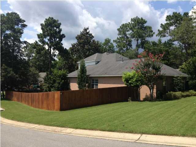 Available Now. Large 4 bedroom 3 bath brick home situated on corner lot, in highly desired Rocky Bayou Country Club Estates. Convenient to both military bases, A+ rated schools, championship golf courses, and just minutes from the world's most beautiful sugar white beaches! Step inside to a spacious living area with 9' ceilings, gas fireplace, custom crown molding, and recessed lighting. Bonus room just off the living area can be used for a large office, media room or study area. Rich hardwood floors flow throughout living area into formal dining room which features trayed ceiling and lots of natural light from the large windows. Kitchen provides plenty of oak cabinetry, granite countertops, tile backsplash, and glass cooktop. Pets may be allowed w owner approval & deposit