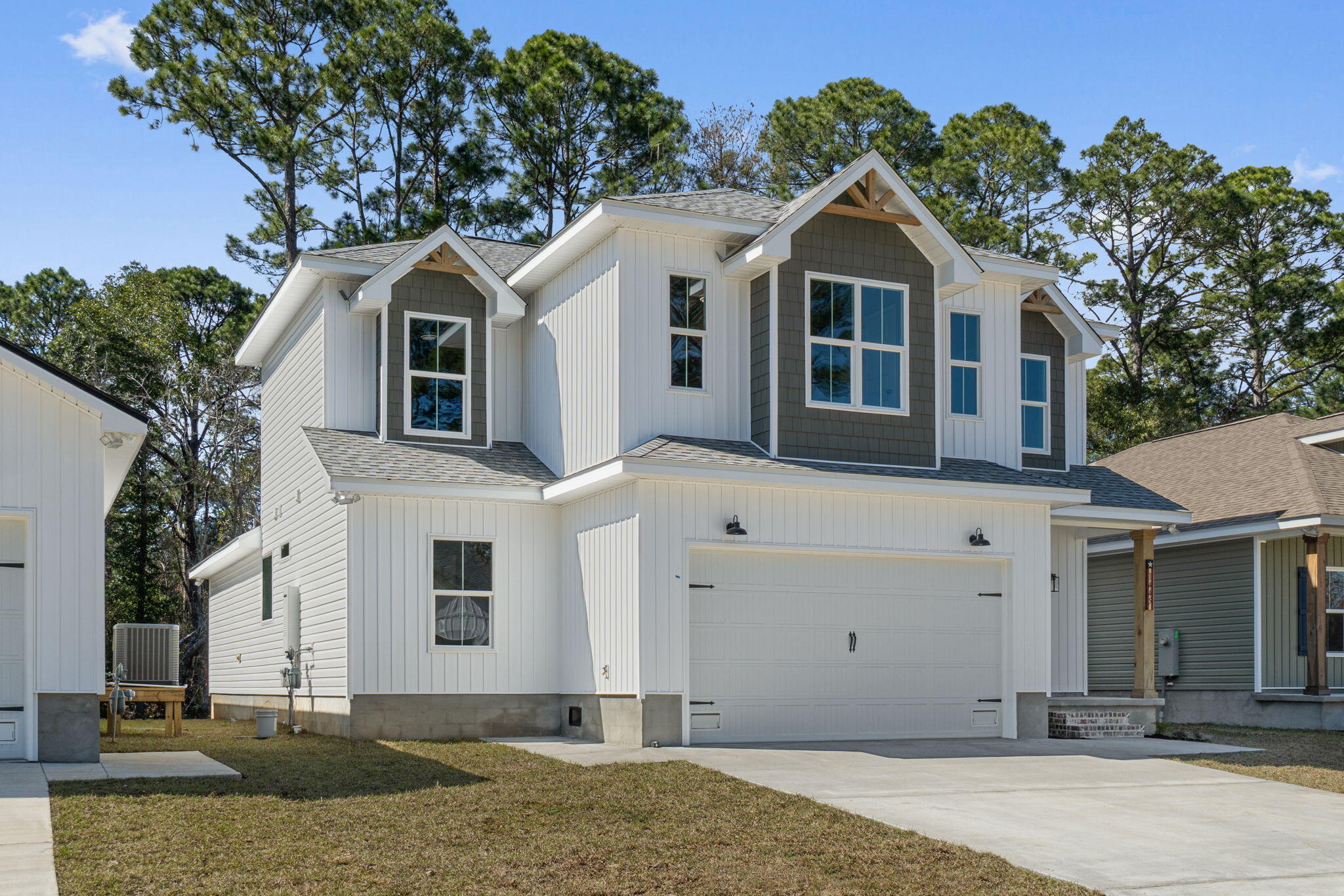 Welcome to a home that seamlessly blends craftsmanship, comfort, and the benefits of new construction--without the long wait. This semi-custom, Craftsman-inspired residence offers approximately 2,500 square feet of thoughtfully designed living space, featuring 4 bedrooms, 3.5 bathrooms, and a versatile loft area perfect for a desk, reading nook, or small home office. Now well underway and nearing completion, this home offers the convenience of a brand-new build with an anticipated finish at the end of April 2026. At the heart of the home is the open-concept living area, where the kitchen flows effortlessly into the family room, highlighted by custom cypress wood beams that add warmth and architectural character. The chef's kitchen is designed for both everyday living and entertaining,  featuring a gas range, butter pantry, generous workspace, and a tankless water heater for continuous hot water. The owner's suite serves as a true retreat, complete with a spa-inspired bathroom that includes a freestanding soaking tub and a beautifully tiled walk-in shower--creating a space that feels both relaxing and refined. Thoughtful design and quality craftsmanship are evident throughout the home, offering a well-balanced layout that suits both daily living and entertaining. Estimated completion: End of April 2026. Photos shown are of similar completed homes and are for illustrative purposes only. Final finishes may vary. If you've been searching for new construction with character, this is an opportunity you won't want to miss.