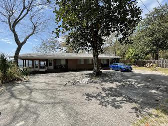 Do not disturb tenants! Duplex- 2 bedrooms/2 full baths units with views of Lake Vivian, Choctawhatchee Bay and Okaloosa Island on the horizon. New Roof completed in 2018. Unit A has a screened in large porch. This unit has been completely remodeled in 2018 from the studs. New flooring, New walls, New appliances, New fixtures, New HVAC in 2017, New Water Heater, and all bathrooms have been remodeled with an easy walk in shower. Unit B New Water Heater 2021, New Oven 2016, New paint in Kitchen and Family room, paneling in the bathrooms and bedrooms.  The County just finished a project that elevated Meigs drive in front of the property. Both units are occupied at this time on a month to month. All measurements must be verified by the buyer.
