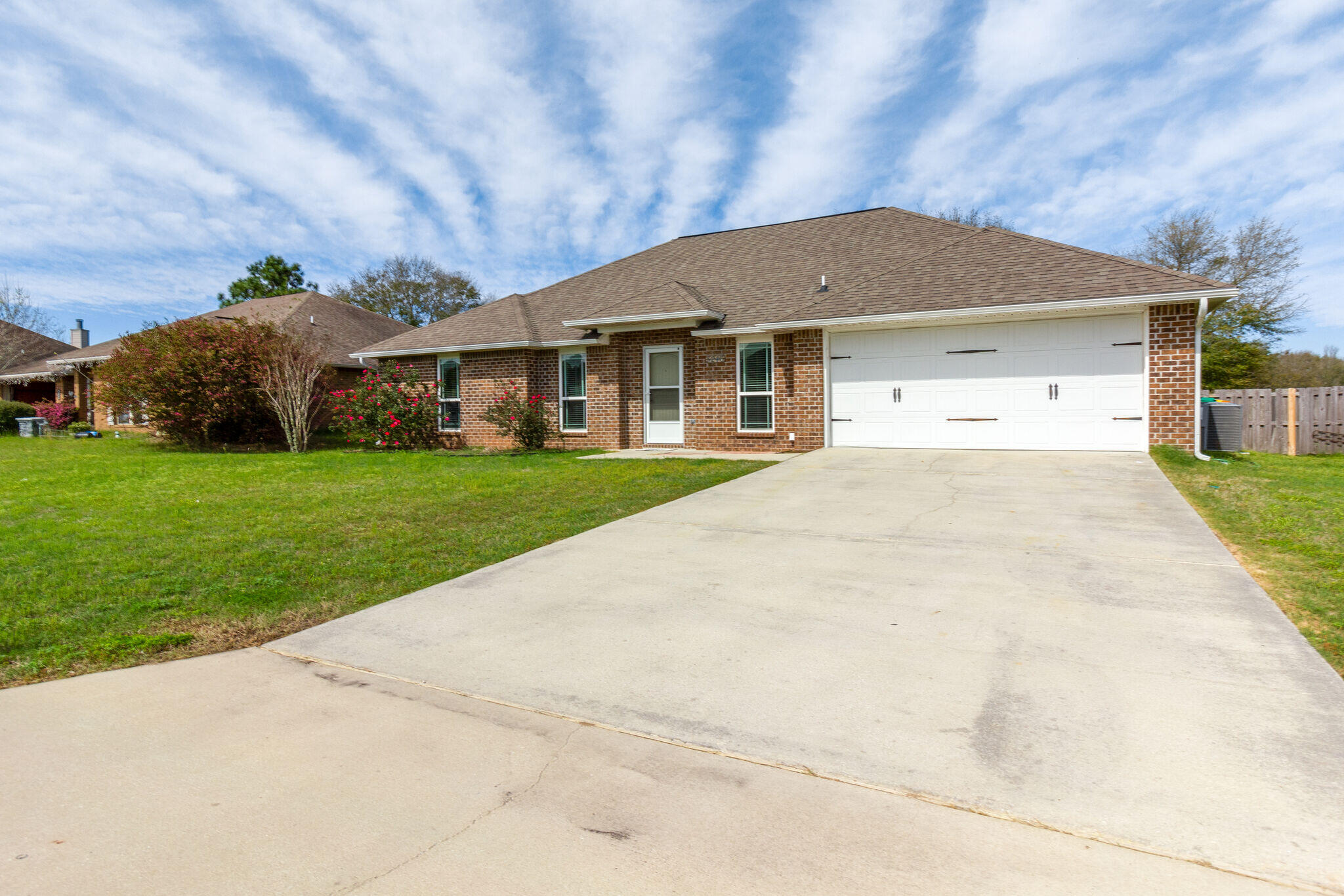 Beautiful home in sought after area in Lee Farms subdivision. This 3 bedroom home has a split floor plan with NEW hardwood floors in the bedrooms and living room and ceramic tile in the wet areas. The kitchen has granite countertops and stainless appliances. Master has decorative shiplap on wall, walk in closet and a Bluetooth speaker light/fan in the bathroom so you can sing while in the shower. The home is equipped with a water softening system. The backyard has a beautiful open deck, flat yard and is fully fenced. Call for a viewing today!! 850-786-1255 or apply at rentwithbsr.com