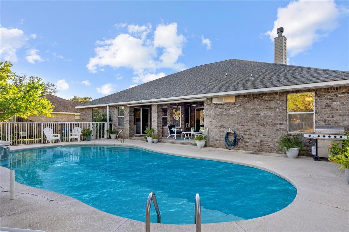Welcome to this beautiful and spacious 4-bedroom, 3-bathroom home offering the perfect blend of comfort, functionality and Florida living. Tucked on a nearly .5 acre lot in the desirable Holly by the Sea community, this home features a thoughtful split floor plan, dedicated office, formal dining room, and a cozy breakfast nook overlooking the pool and patio.
One of the bedrooms includes its own private lockout option—ideal for guests, multigenerational living, or even rental income. This suite has private bathroom access and opens directly to the pool area, creating a true retreat. The primary suite also enjoys private pool access, offering a seamless indoor-outdoor lifestyle. The kitchen is a chef's delight, offering stainless steel appliances, granite. Re-Roof 2019