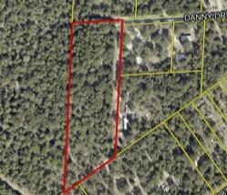 Approximately 6 acres with an existing mobile home built in 1997. Property conveys as-is and is priced primarily for land value. Buyer to verify all information, contact listing agent for all showings.