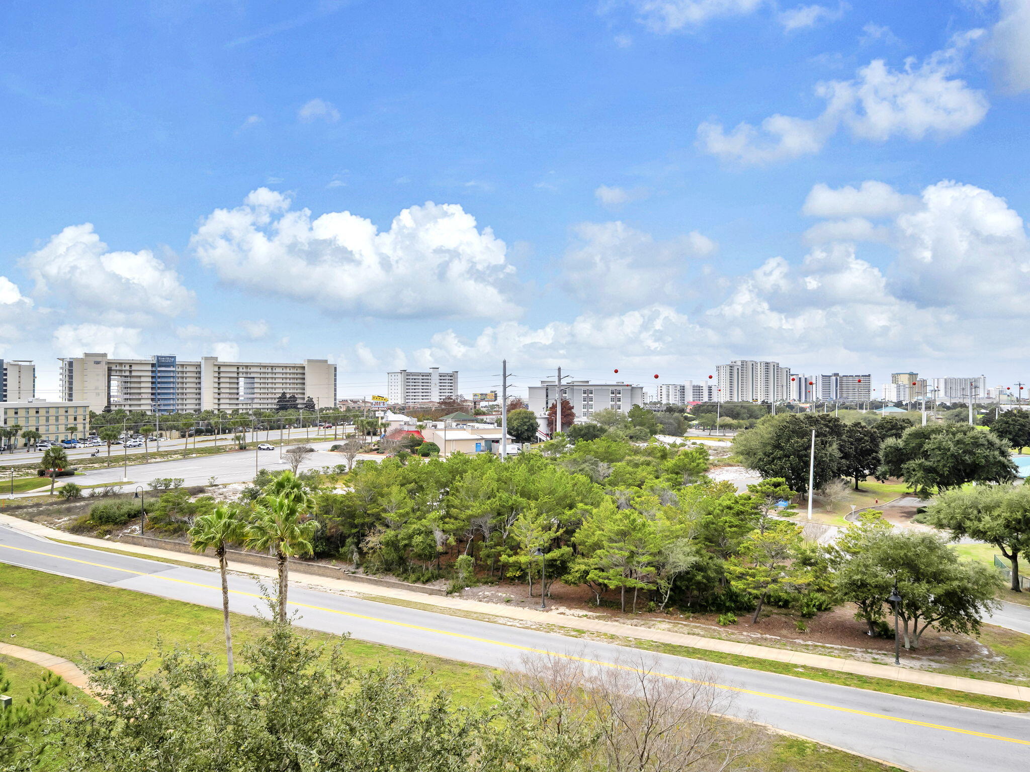 Discover the ultimate coastal retreat at The Palms of Destin, at the ''World's Luckiest Fishing Village.'' This turnkey 2BR/2BA west-facing condo is fully furnished and ready for your next vacation or a lucrative rental season. Enjoy stunning sunsets with an 11 minute walk to the beach. The bright interior features an updated kitchen with granite countertops and light cabinetry. New floors recently added throughout-NO CARPET.
As a premier resort on the Emerald Coast, The Palms offers unparalleled amenities: an 11,000 sq ft zero-entry lagoon pool with waterfalls, a heated pool, whirlpool spa, and a children's splash pad. Stay active with on-site tennis and basketball courts, a state-of-the-art fitness center, and a playground. Perfectly located in the heart of Destin, you're just minutes from the Harbor Boardwalk, Destin Commons, and sugar-white beaches via the seasonal resort shuttle. Covered parking included. Don't miss this opportunity to own a piece of paradise in one of Florida's top travel destinations. Buyer to verify all information.