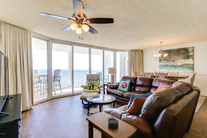 This beautiful 1326 square foot, extensively upgraded, 11th floor, 2bed/2bath condo is considered by many to be the best 2bed floor-plan on the beach! Property enjoys floor-to-ceiling views of the Gulf from both bedrooms and great room that steps out to the large private balcony. Extensively remodeled and meticulously maintained. Conveys fully-furnished, turnkey, and rental ready. Custom tiled floors throughout means easy clean-up and ultra-low maintenance. Shaker cabinets, and Stainless Steel in the kitchen! Both master bedrooms are gulf front and have access to the enormous main balcony. Both also have en suite baths that feature new stained maple cabinets, custom showers, and double vanities. Separate spacious laundry room with washer and dryer provides plenty of extra storage room