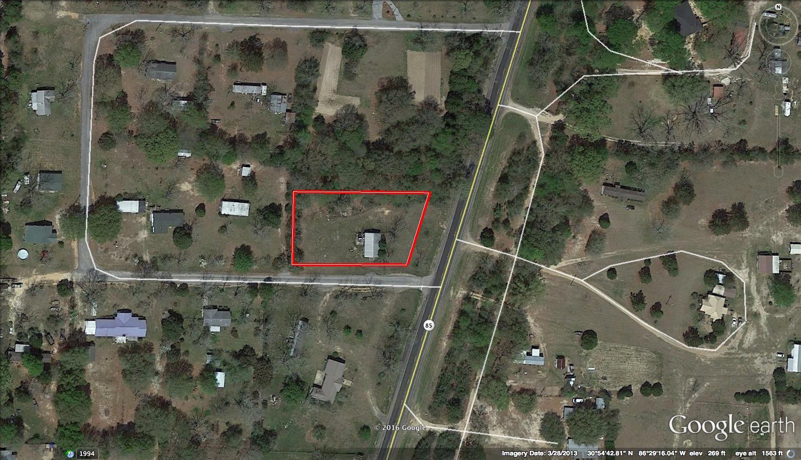 Beautiful , level lot on the corner and visible from 85. Possible commercial use. Beautiful trees! Mostly clear! 1,050 SF Storage Building conveys as-is