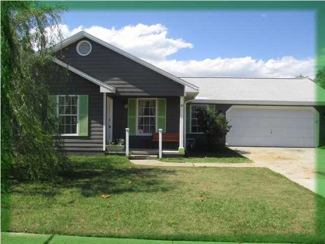 In EXCELLANT location!! This 3 bdr/2 bath/2 car garage home with cathedral ceilings, has a great floor plan, and is awaiting your arrival. Let the pictures tell the story. The new renovated kitchen with plenty counter and cabinet space, and stainless steel appliances is what any chief would love, and order! Great neighborhood with lots of privacy as it is backed up to the Hurlburt reservation. Large patio overlooks the sparkling guinite pool. Has nice fire pit too. You must come and see for your self. Worth Seeing, Worth Renting. Call for your Appointment today!
