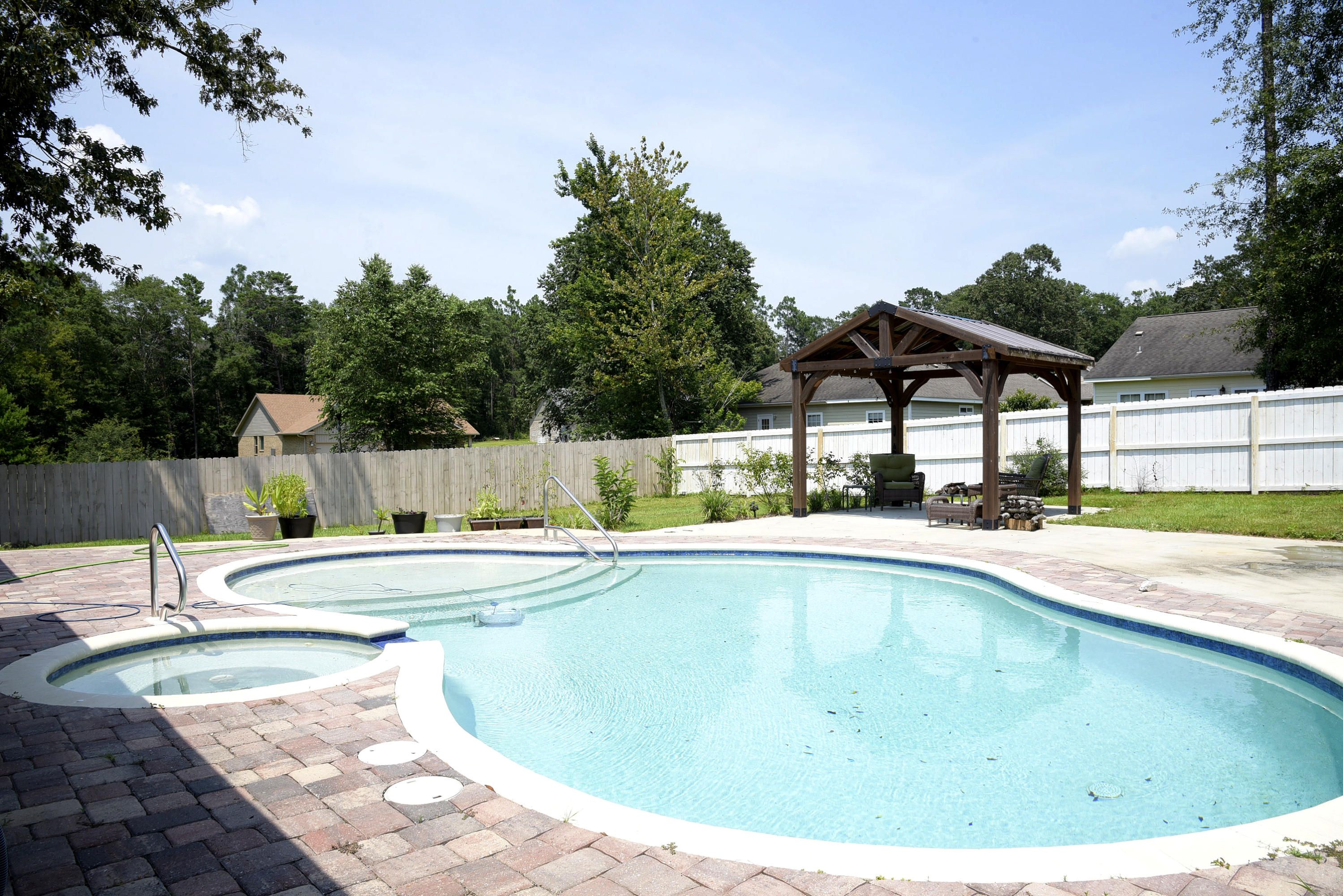 Taking back up offers! This one story BRICK home with a great POOL is tucked away in lovely, quiet north Crestview. With it's open design, four large bedrooms and 3 baths it provides plenty of room for living the Florida lifestyle. There is a large dining room, a gorgeously appointed kitchen with lots of GRANITE counters, STAINLESS appliances and a LARGE BREAKFAST BAR that make the kitchen perfect for large parties or those fall football games! A huge living room gives everyone plenty of space and the many closets help round out a terrific floorplan. The fully fenced backyard is perfect for year round enjoyment and entertainment! The beautiful GUNITE POOL beckons you to dive in and cool off and then enjoy a beverage or meal under the pergola beyond. There are lots of PAVERS and cement for your outdoor furniture, and still there is plenty of grass! The pictures do not do this one justice. You will want to see it for yourself.