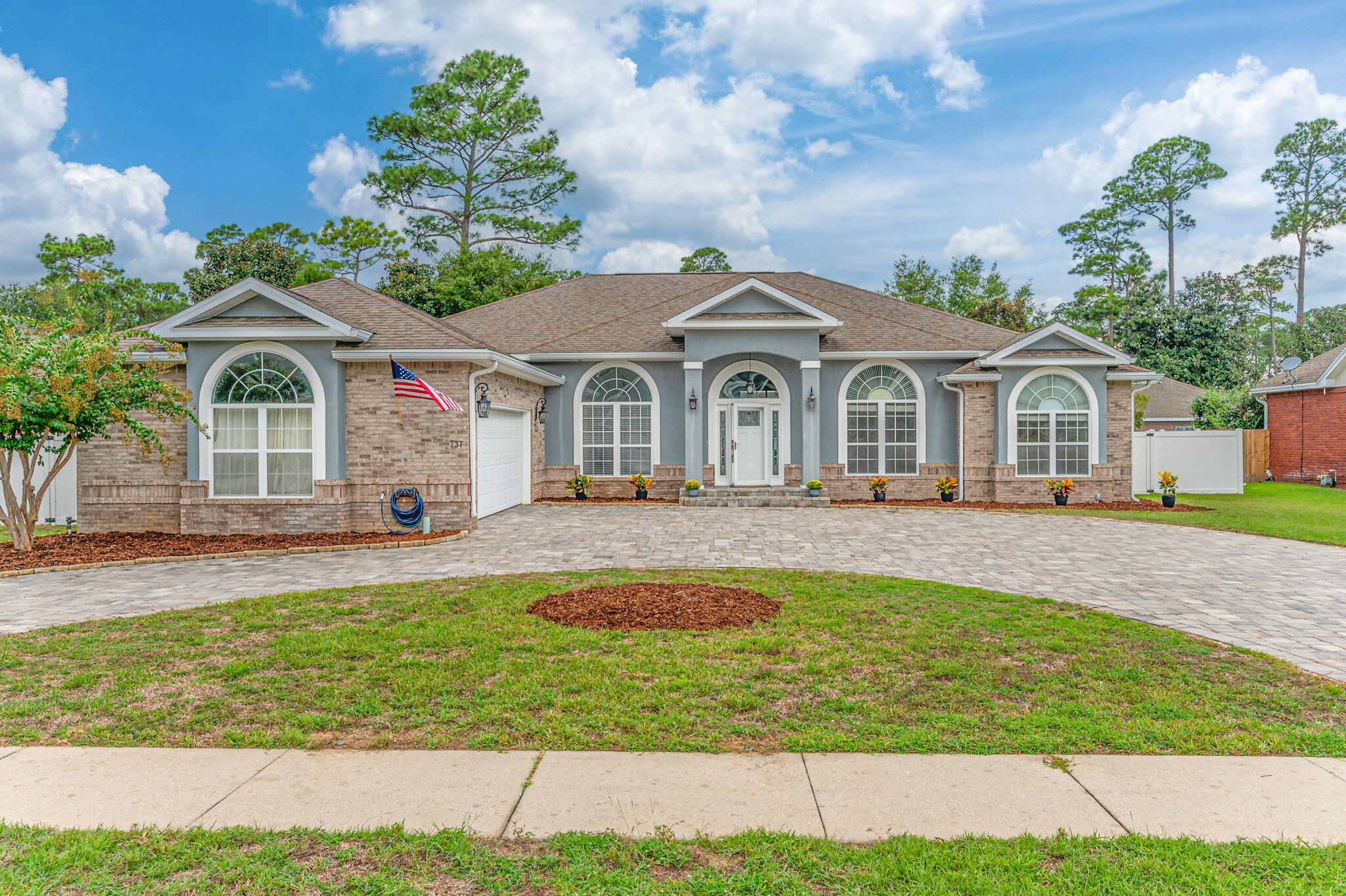 New Roof at Closing! An elegant home in a beautiful neighborhood located in the heart of Niceville with exceptional curb appeal. The home opens to 2,575 sq. ft. of open living space featuring laminate floors throughout the main living area, formal dining area and continues into the kitchen.  Granite countertops and updated backsplash with lovely cabinet colors make this kitchen a winner! Master suite is quite large and features a dual-head walk-in shower and separate jetted soaker tub.  The split floor plan is perfect for that growing family. 
Built-ins on either side of the fireplace make for an inviting family room. 
Pool and hot tub are screened in and ready to help you relax. Call to see this one today.  Open House Sat and Sun 23-24 September.