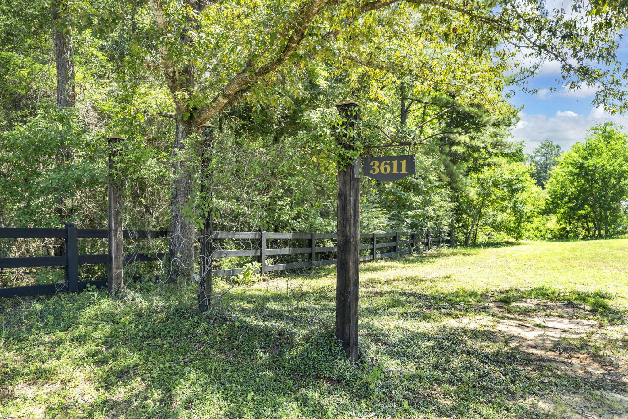 BARNDOMINIUM-READY on 13.3 stunning acres just west of the charming farming town of Laurel Hill. Already in place is a beautifully engineered 30' x 60' red iron steel building with a 15' x 30' lean-to patio—built to endure 150 mph winds and set on a 6'' thick, 3,000 psi concrete slab. With metal conduit electrical, full bath, walk-in closet, and RV hookups, it's ready for immediate use or conversion into a unique barndominium residence. Add your custom touches, or build a separate dream home while using the structure for storage, workshop, or guest quarters. This land is ideal for farmers, gardeners, and animal lovers: open pasture for livestock, fertile soil, and plenty of room for crops, greenhouses, or orchards. A perimeter stream/creek flows through most of the property, creating a natural watering source and peaceful setting. A designated deer hunting stand sits tucked in the wooded area, and the entire acreage is teeming with Florida wildlife -- deer, wild turkey and native birds. Whether you're an outdoorsman or simply a nature enthusiast, this property is a sanctuary.
Highlights include:
1) Red iron building (2017): 1,800 sq ft enclosed + 450 sq ft covered patio
2) Full bath, walk-in closet, washer/dryer hookups, and internet service
3) 900-gallon septic, 50-amp RV hookup, and insulated walk door
4) Fenced pasture areas (wood rail + barbed wire)
5) RV-ready with on-site public water/septic access
6) Rich in game and wildlife habitat
7) Creekfront boundary with year-round water flow
Located just 45 minutes to the Gulf of Mexico, Choctawhatchee Bay, and minutes to Crestview, this is a rare opportunity to own a build-ready, multi-use property with the perfect blend of rural seclusion and modern access. Plant roots, grow food, raise animals, or relax beneath the starsyour Florida homestead awaits.