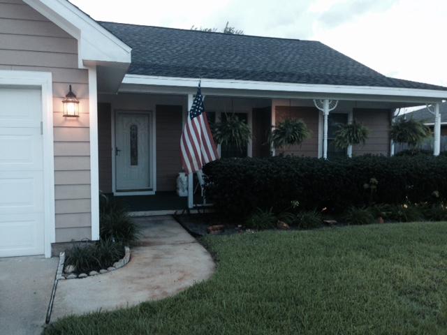 Pet friendly, well maintained 3 Bedroom 2 bath home in the heart of Navarre. Great floor plan with 10' ceilings in great room, eat in kitchen, fireplace, ceiling fans in all bedrooms, walk-in closet in master bedroom and guest room, concrete pad next to garage for boat parking. Sprinkler system/Lawn Pump on timer. Slate floors in common areas, carpet in all bedrooms. Kitchen, living room, dining room and fenced backyard with large sun room that runs the length of the house. House is already equipped with range, refrigerator, microwave and washer/dryer. Deposit is $1000 and can be paid in three payments for most renters.