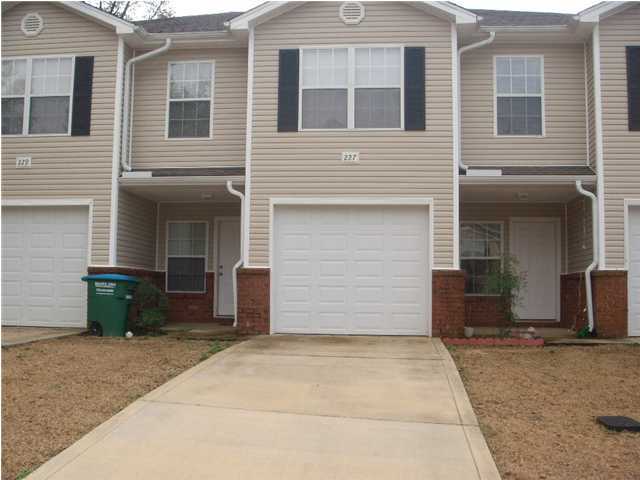 WONDERFUL 2-STORY TOWNHOUSE WITH LOTS OF SPECIAL FEATURES. WORRY-FREE VINYL AND BRICK EXTERIOR WITH DIMENSIONAL SHINGLED ROOF. ENERGY EFFICIENT ALL ELECTRIC. NEUTRAL DECORATOR COLORS. CEILING FANS IN THE LIVING ROOM & BEDROOMS. SPACIOUS ROOMS. NICE KITCHEN HAS SOLID SURFACE COUNTERS, UNDER-MOUNT SINK, BREAKFAST BAR, LOTS OF OAK CABINETS & A BUILT-IN-MICROWAVE OVER THE STOVE. PANTRY. TILE FLOORS IN THE FOYER, HALL KITCHEN & BATHS.CARPET EVERYWHERE ELSE. HALF BATH WITH PEDESTAL SINK AND PRETTY MIRROR FOR YOUR GUESTS. MASTER SUITE WITH A WALK-IN CLOSET. DUAL VANITIES IN THE MASTER BATH. INSIDE LAUNDRY. PATIO. 1-CAR GARAGE WITH AUTO OPENER. SECURITY DEPOSIT INCLUDES NONREFUNDABLE FLOOR CLEANING FEE. CREDIT CHECK FEE IS $25 PER PERSON. IF PAID BEFORE THE FIRST OR WITH ELECTRONIC FUNDS TRANSFER OR MILITARY ALLOTMENT.