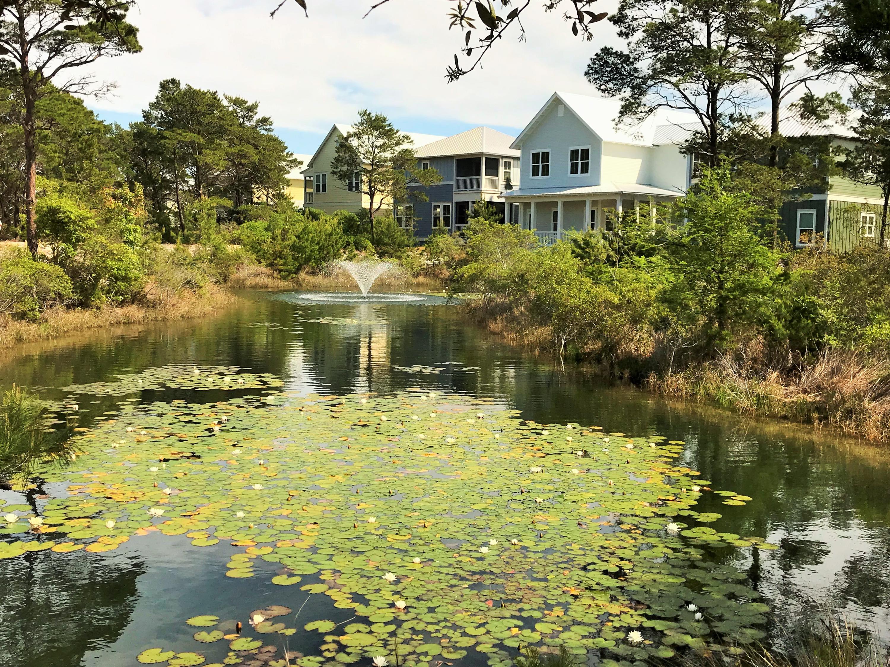Highland Parks at Blue Mountain is one of the most charming neighborhoods on 30A with an impressive hilltop resort style community pool and entertainment pavilion. The pool area is further enhanced with a firepit area and viewing tower for expansive panoramas of the coast and State Forest. This homesite is one of the remaining available lots in Highland Parks to build your signature beach home. A great neighborhood for a full time residence or investment property.
Lot 59 is located at the south corner of a picturesque pond with water feature. Beautiful coastal architectural homes with nostalgic porches surround this property.
Highland Parks is conveniently located to the Blue Mountain Public Beach Access or Gulfview Heights Public Beach Access, restaurants and bike path.