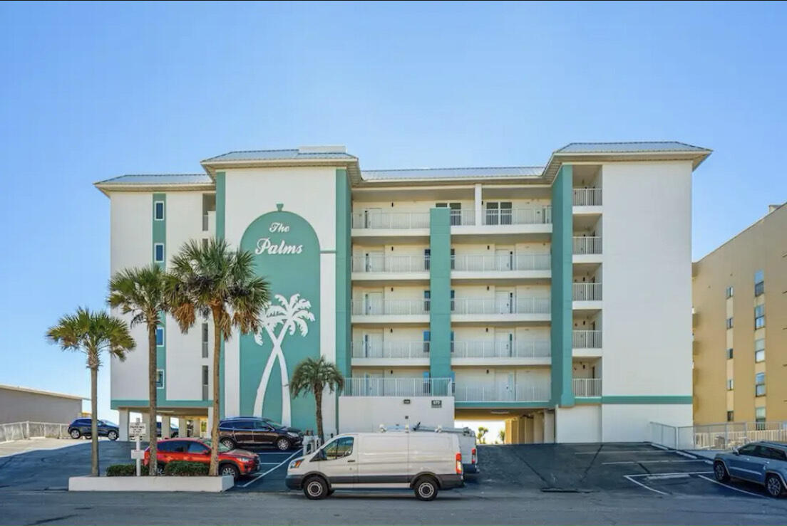 This stunning 2-bedroom condo offers spectacular Gulf views from almost every room! A 2million+ exterior renovation completed in 2022 makes this low-density building stand out from the others with only 23 units!  Some of the exterior renovation includes new steel I beams, new balconies and railings, beautiful new exterior building color, new high impact sliding glass doors and windows, new boardwalk w/security gate and more! Watch the waves crash against the shore and be captivated by the sight of dolphins dancing in the crystal-clear waters. The interior updates offer beautiful new laminate wood flooring throughout, newly resurfaced ceilings, updated bathrooms, kitchen, and freshly painted walls gives this home a clean modern feel. New HVAC in 2022. The convenience of a washer and dryer within the unit ensures that you can enjoy a beach lifestyle without the hassle. This condo has a reserved covered parking spot so you never have to worry if you will have a place to park. This piece of paradise is conveniently located to Destin and some of the best restaurants and shopping that the Emerald Coast has to offer. Indulge in the ease of coastal living while relishing the elegance of your newly renovated beachfront oasis. Whether you're looking for a permanent residence, a vacation retreat, or an investment opportunity, this condo offers it all. Don't miss the chance to own a piece of paradise - schedule your private tour today and make beachfront living a reality.