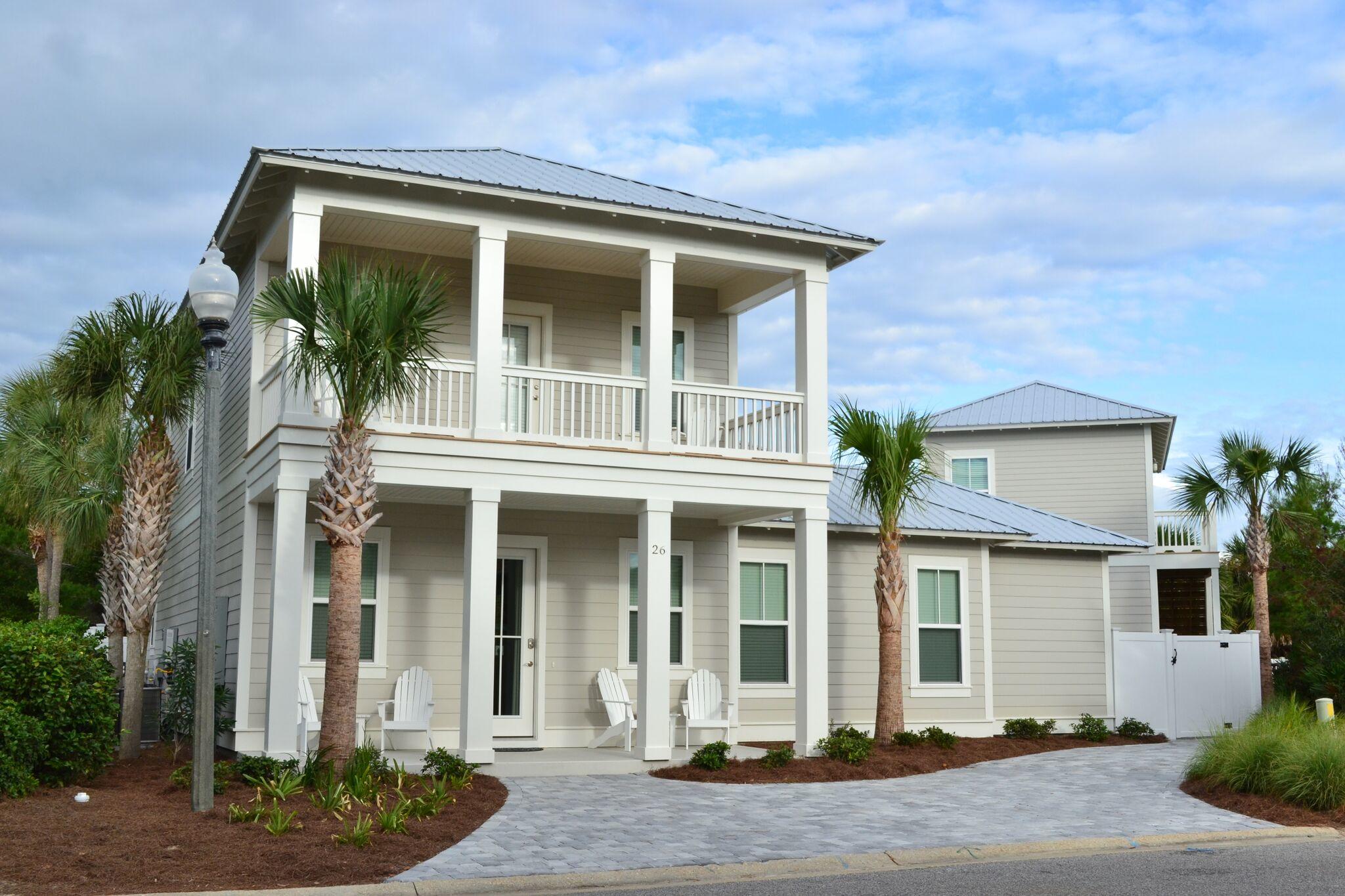 Beautiful home in gated beachside community-Emerald Waters Village. Private deeded beach access. Only a 3 min walk to the beach. Impeccably maintained, tastefully decorated, this new home is stunning. Open concept floor plan is perfect for entertaining. Kitchen has large island, stainless appliances & granite counter tops. Three King BRs in main house & 4th in separate guest quarters above detached garage could all be considered MBRs as they all feature full baths & cozy balcony/deck/patio areas. Adorable 4 bunk area w 4 built-in bunks & 1/2 BA attached. As a vacation home they don't get any better than this. Perfect for large or small groups. This superb home sleeps 14 comfortably & includes all you need for the perfect vacation. Custom private pool (14x20) features an 8' Baja deck plus  an  unheard of 500 sf of paver pool deck and is safely gated. Plenty of space for outdoor entertaining with a 14x30 dining/grilling patio & 18x24 covered patio. 3-4 parking spaces w additional commons parking directly in front of the home. Rental income for 2017 at $115K & 2018 is projected to be even higher. This truly amazing home has received many rave reviews from happy and satisfied vacationers. These reviews as well as rental incomes are available upon request.