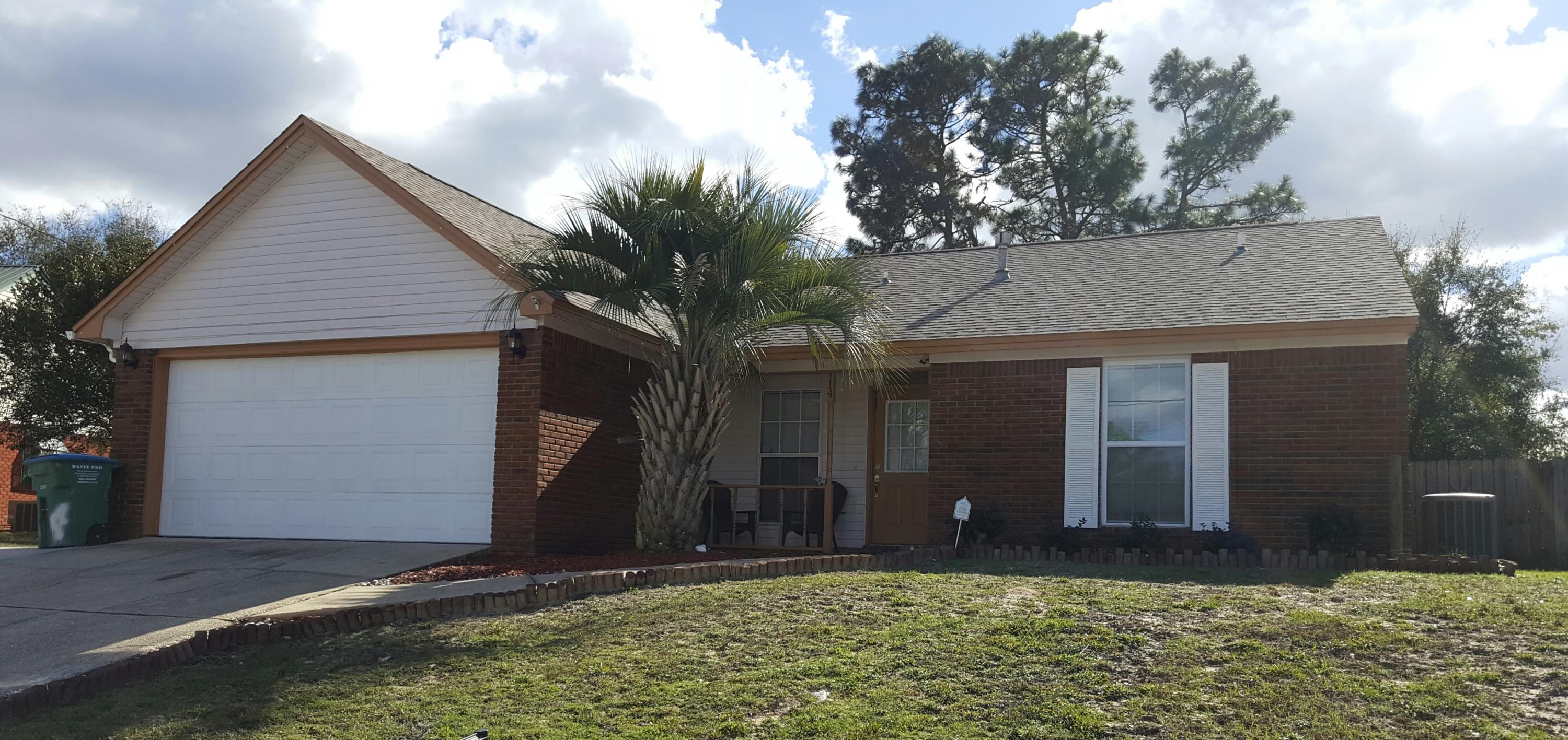 Who doesnt want to live south of I-10?!!!! Only 15 min to Duke field and the 7th Group Compound. This home is move in ready. Large fenced back yard with plenty of room for the kids to play. Once the kids are in bed enjoy a romantic evening in front of the fireplace. This home is just waiting for a new family to call it home! This home is all brick and has a split floor plan. Roof, water heater, and windows only 2 years old. All appliances will stay. Elemetry school bus stop at end of road, middle and high school is in front of neighborhood less than 5 min walk.