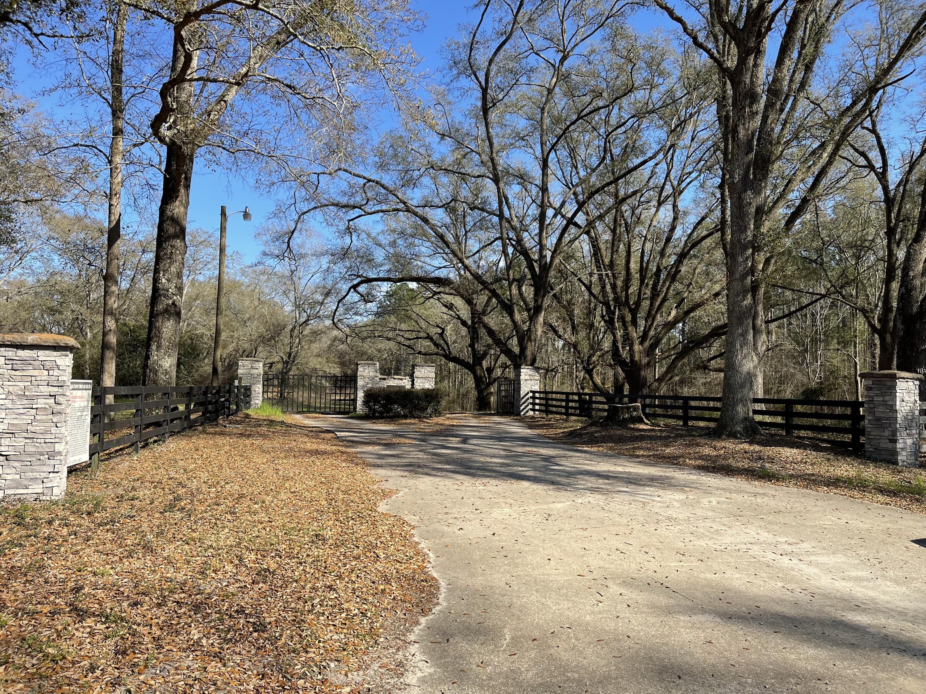 Beautifully wooded 13.38 acre tract of land located in a Gated community just north of Bonifay (a small rural town) in the Florida panhandle.  Looking to have a relaxing retreat in the country.  Well here you've found it.  Makes for a perfect location to build a small cabin and kick your feet up to enjoy the surroundings of nature in this gorgeous country spot. 

Only $400/yr HOA. Property is restricted. Horses allowed. Restricted to Site built Homes only of 1,400 sq ft minimum.

No camping, RVs, Modular or Mobile Allowed.

This is a gated community and agent required to accompany showings for opening the gate.

Places of interest within 30 mins to 1 hr from this property are Choctawhatchee River, Falling Waters State Park, Chipola River Greenway Butler Recreation area.  Ponce De Leon Springs. Blue Springs Recreational Park. Panama City Beach is only 1hr 15 min away. Lot and Lots of natural resources to enjoy!!

Buyer needs to verify building codes and/or zoning regulations with proper local authorities to ensure buyer will be able to utilize the property for intended use.  Information contained within this listing such as dimension, acreage, etc is deemed to be accurate but is not guaranteed