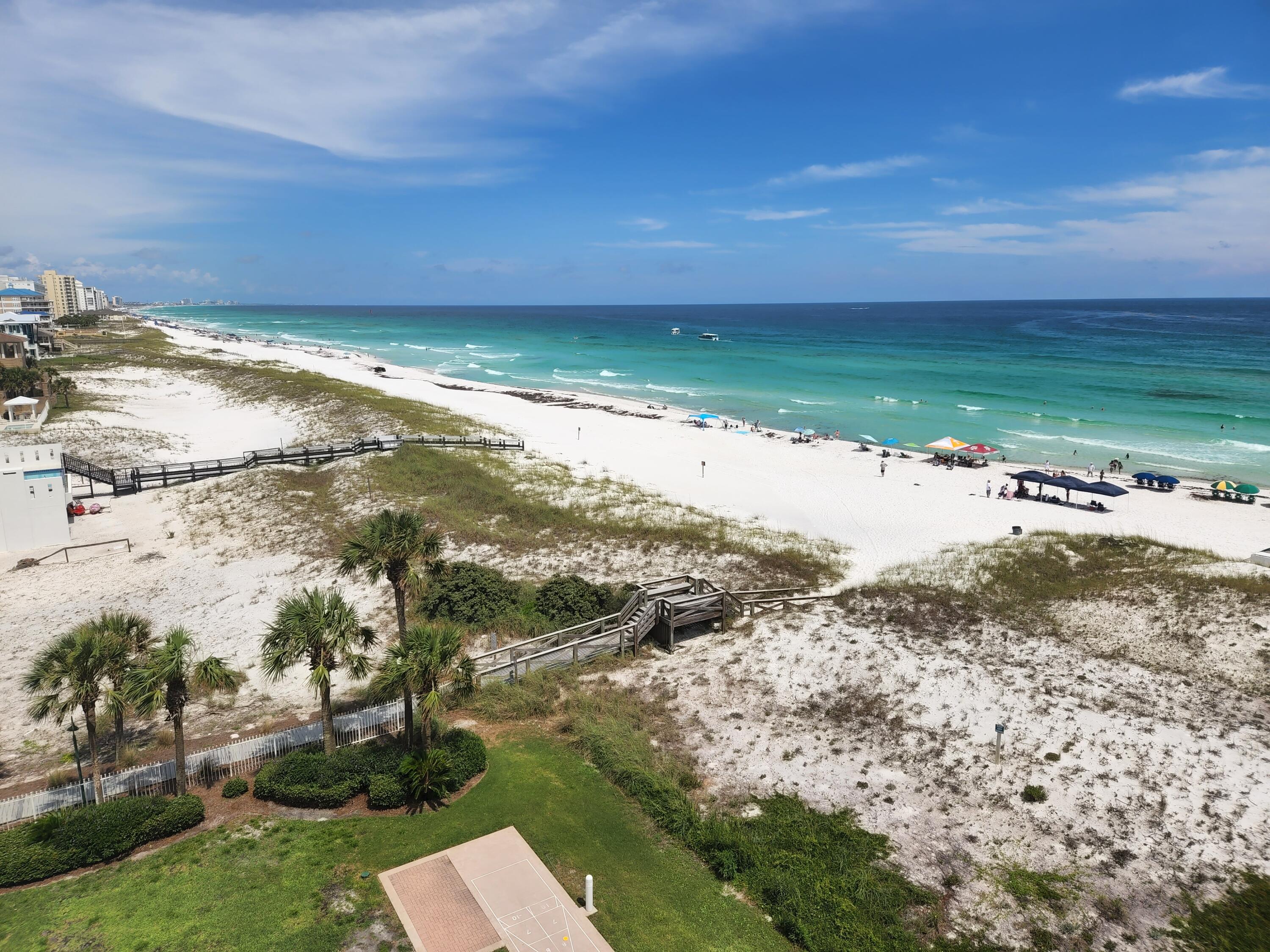 Sugar White Sand Beaches!!! Gorgeous 2 bed/2 bath condo in the well-maintained community of only 42 condos - ''Destin on the Gulf'' on coveted Holiday Isle. Located directly on the sugar white beaches and stunning emerald waters of the Gulf of Mexico. This 7th floor condo has an open floor plan and Gulf front covered private balcony with spectacular Gulf views. Amenities include access to HOA's own private beach with boardwalk, large beachfront community pool, grilling area, airconditioned elevators and community room. Located minutes away from dining, fishing, boat cruises, water sports, golfing and much more. This condo could be a great investment property, second home or is turnkey ready for vacation rentals with a short-term rental history available. Property comes fully furnished. This property is currently on a short-term vacation/rental program and could be subject to reservations. More pictures to come. Please view 360 Tour.